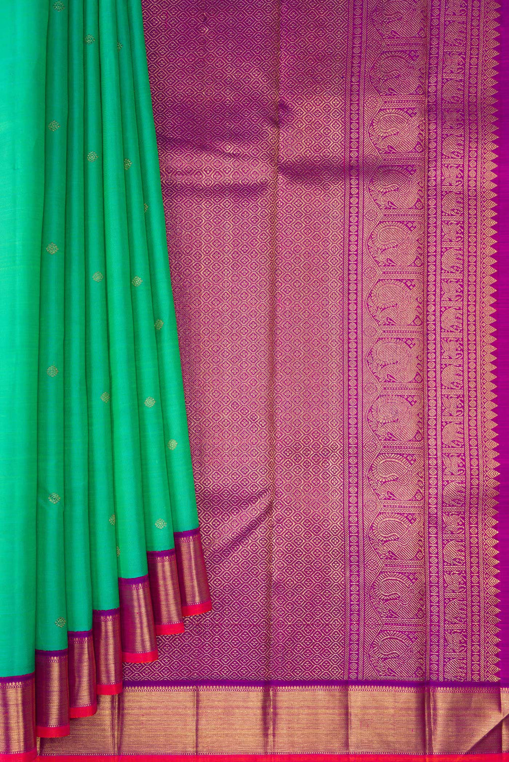 Pleats and pallu of Pure Silk Pure Zari Sea Green Kanjivaram Saree with Zari Butta on the body and Zari Border. 