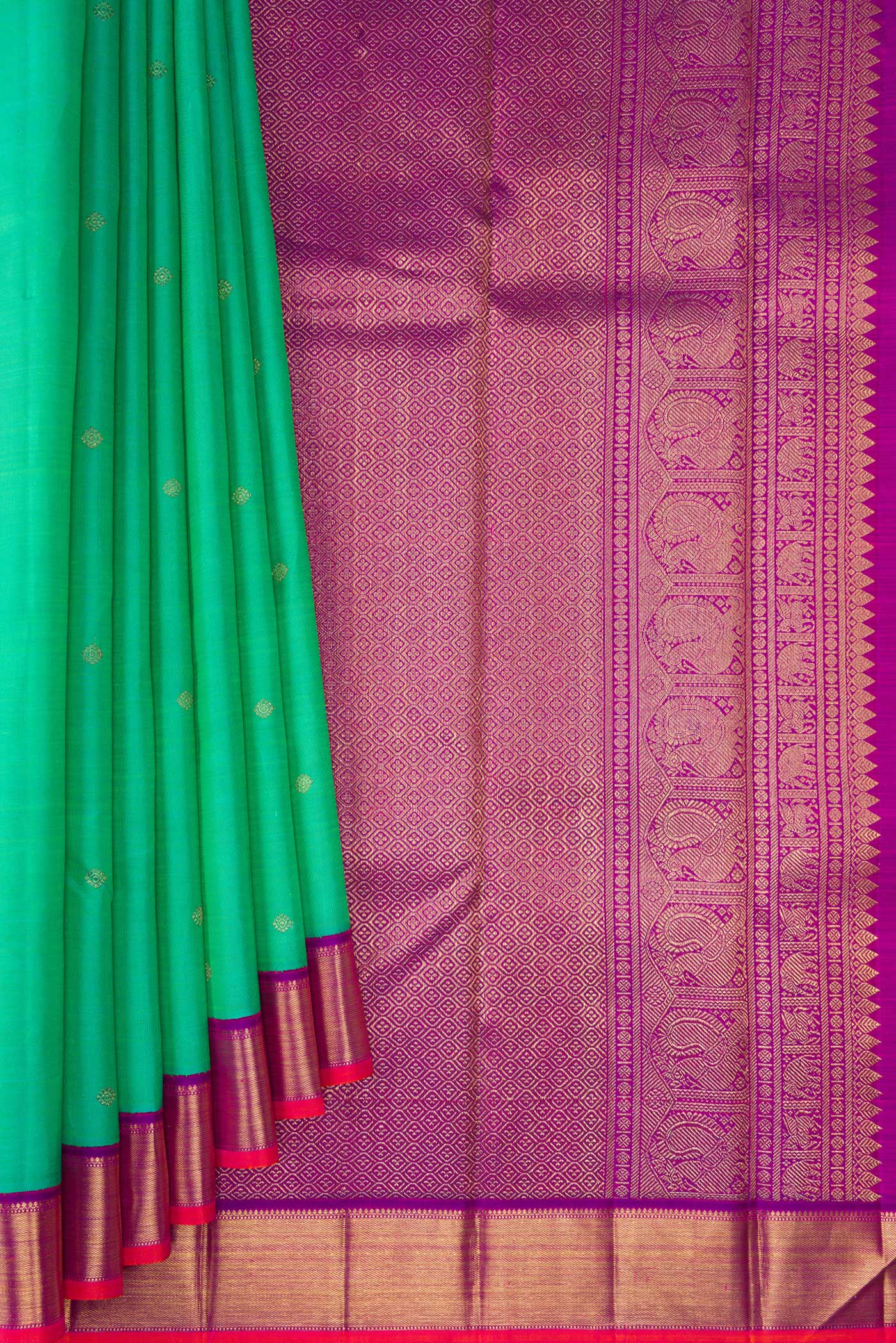Pleats and pallu of Pure Silk Pure Zari Sea Green Kanjivaram Saree with Zari Butta on the body and Zari Border. 