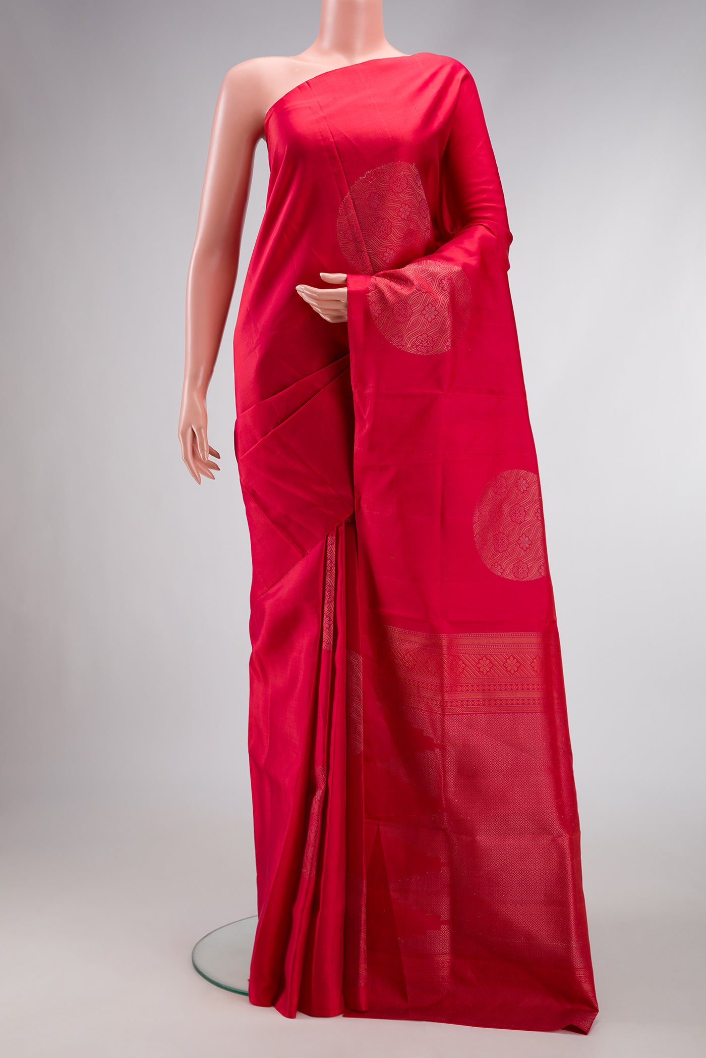 Red Dual Tone Soft Silk Saree with Zari Butta on the body and Without Border.  displayed on a mannequin