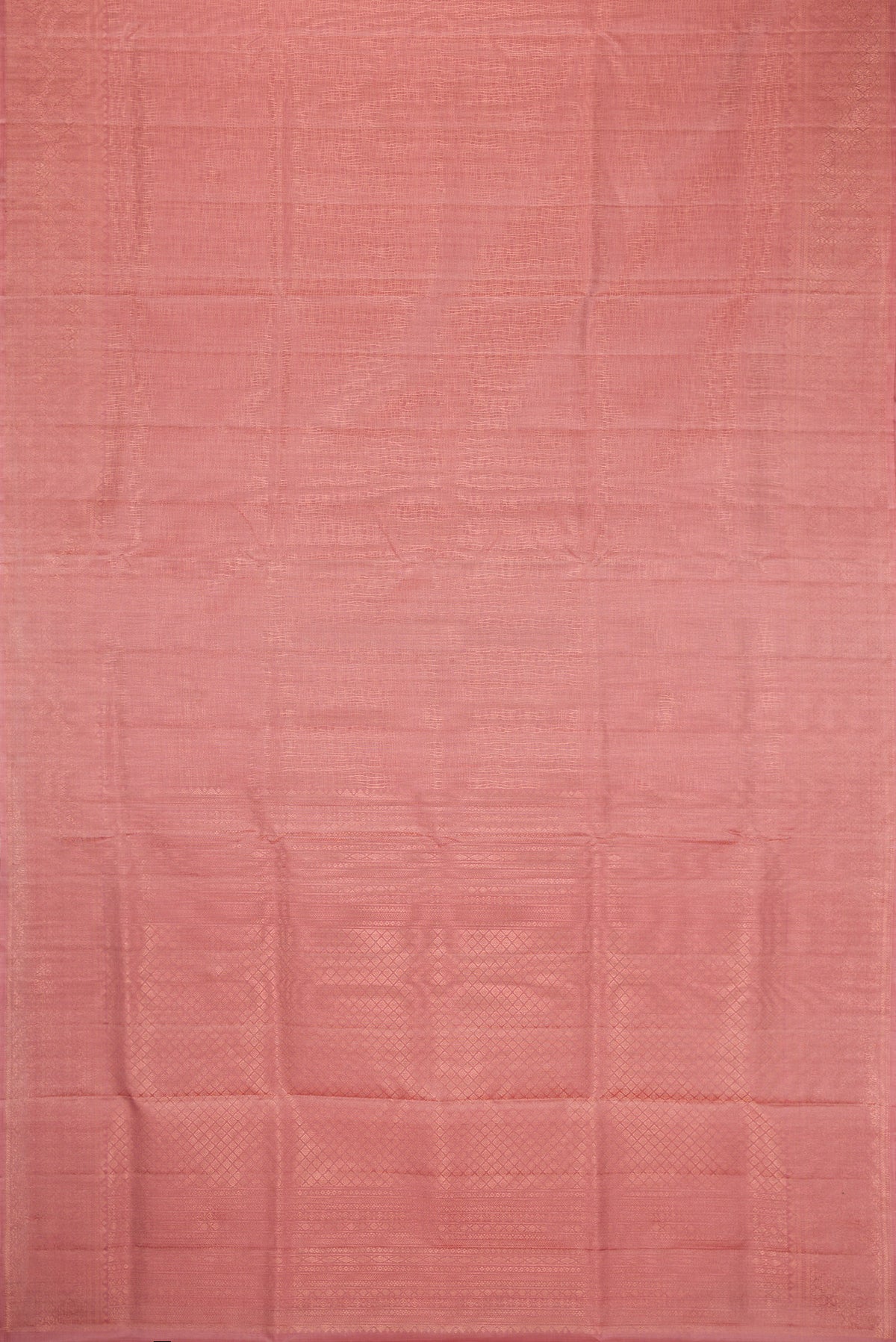 Flat view of Rose Gold Dual Tone Soft Silk Saree with Zari Brocade on the body and Zari Border. 
