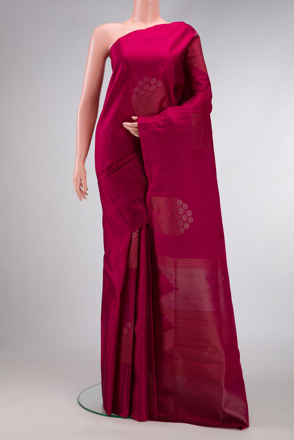 Magenta Dual Tone Soft Silk Saree with Zari Butta on the body and Without Border.  displayed on a mannequin
