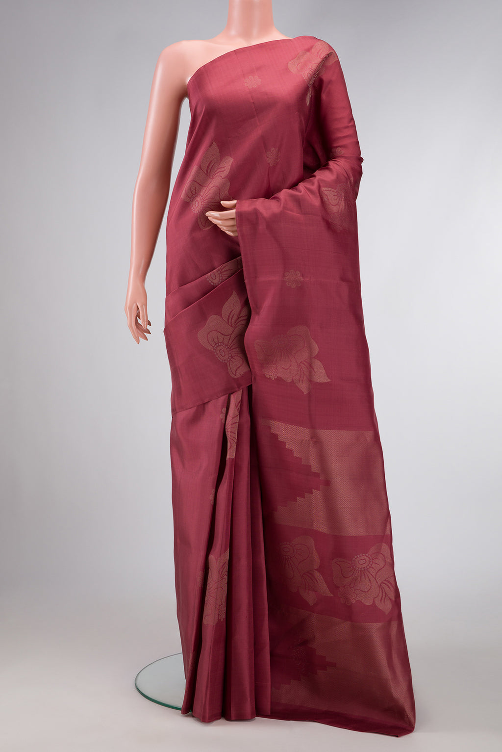 Mauve Dual Tone Soft Silk Saree with Zari Butta on the body and Without Border.  displayed on a mannequin
