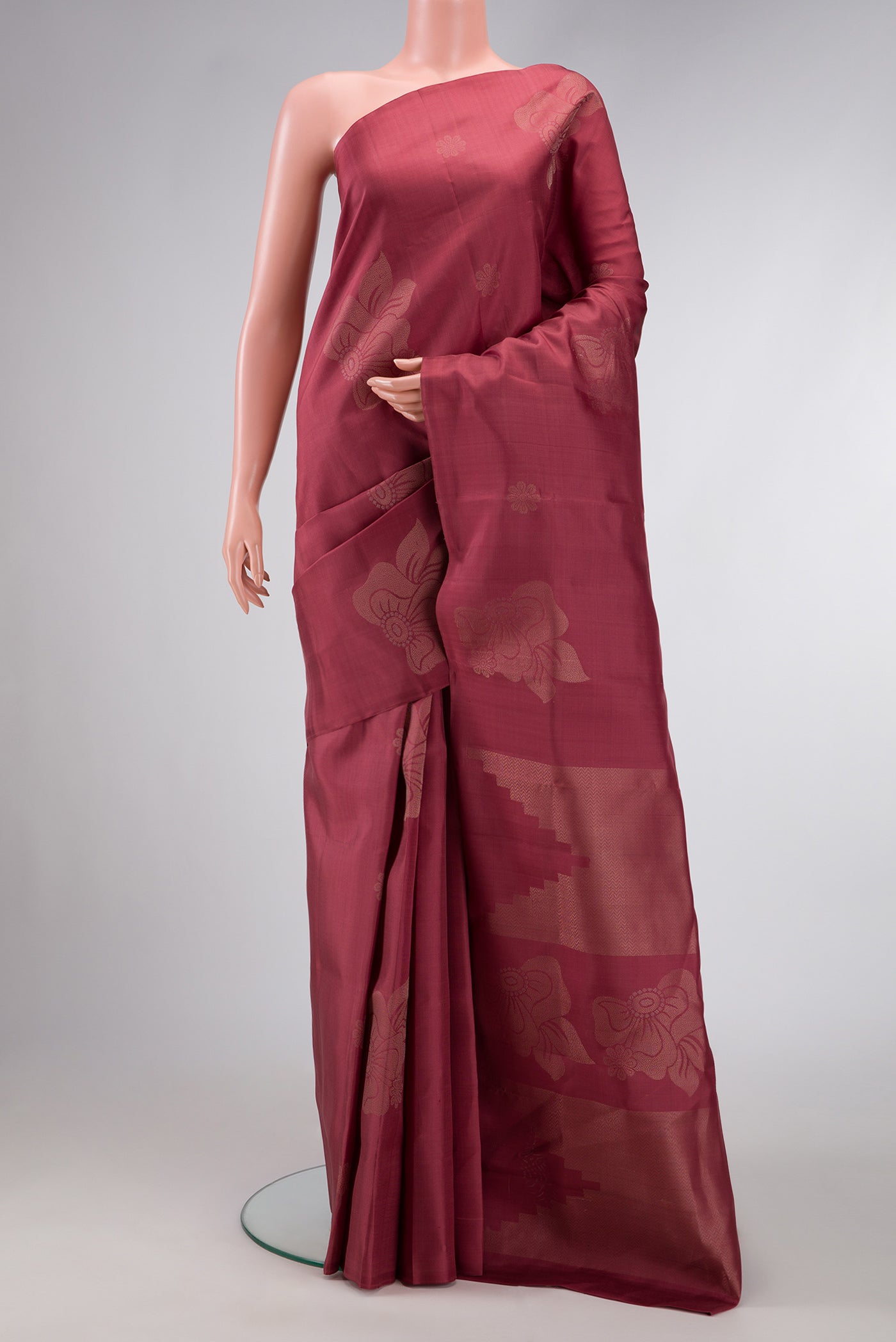 Mauve Dual Tone Soft Silk Saree with Zari Butta on the body and Without Border.  displayed on a mannequin