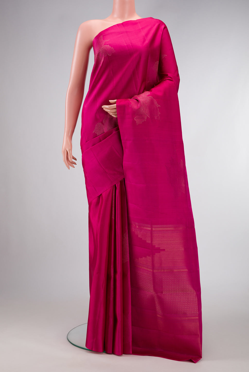 Dark Pink Dual Tone Soft Silk Saree with Zari Butta on the body and Without Border.  displayed on a mannequin
