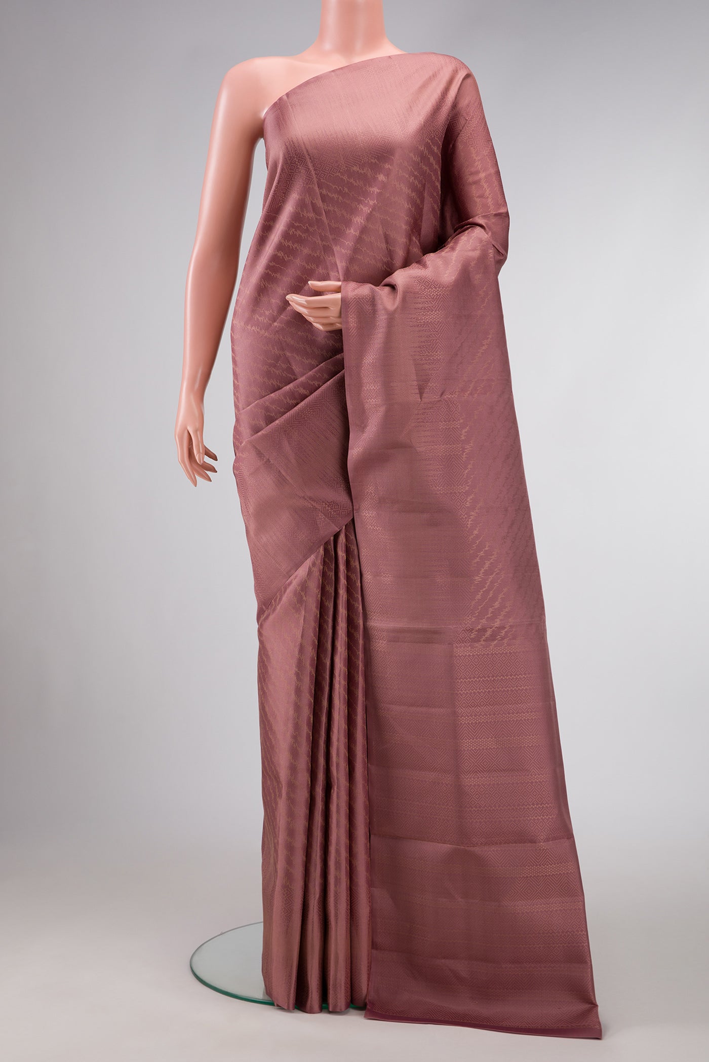 Rose Gold Dual Tone Soft Silk Saree with Zari Brocade on the body and Fancy Border.  displayed on a mannequin