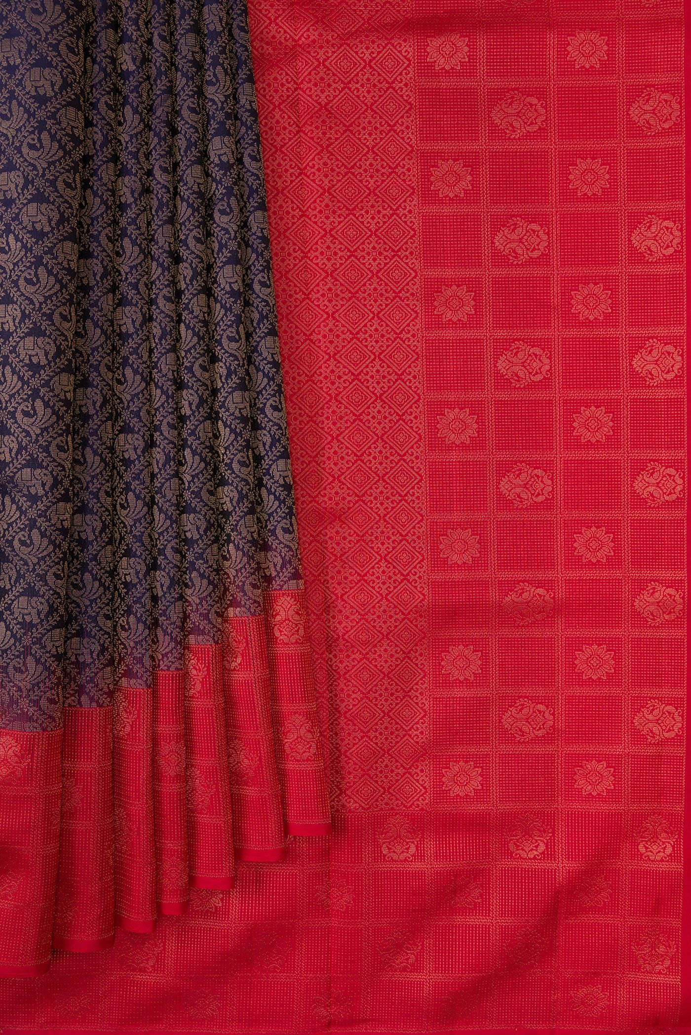Pleats and pallu of Navy Blue Dual Tone Soft Silk Saree with Zari Brocade on the body and Fancy Border. 