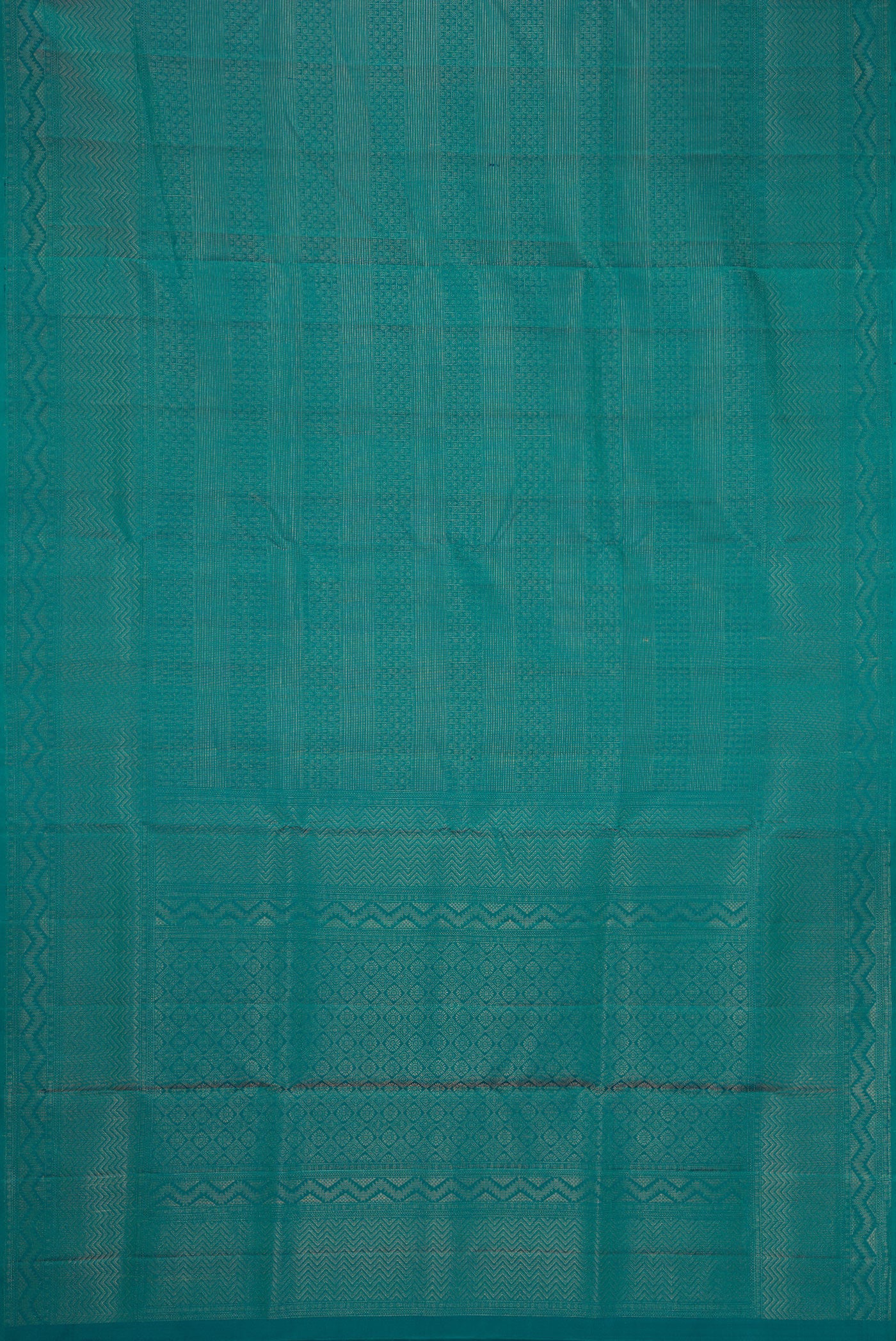 Flat view of Imperial Red Dual Tone Soft Silk Saree with Zari Brocade on the body and Zari Border. 