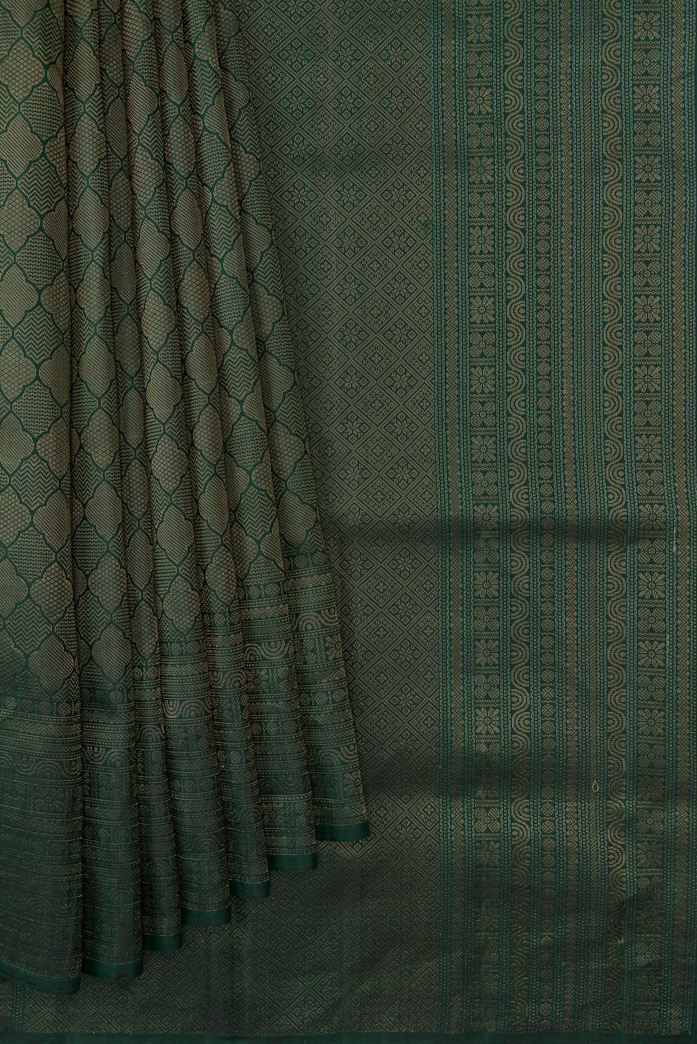 Pleats and pallu of Bottle Green Dual Tone Soft Silk Saree with Zari Brocade on the body and Fancy Border. 