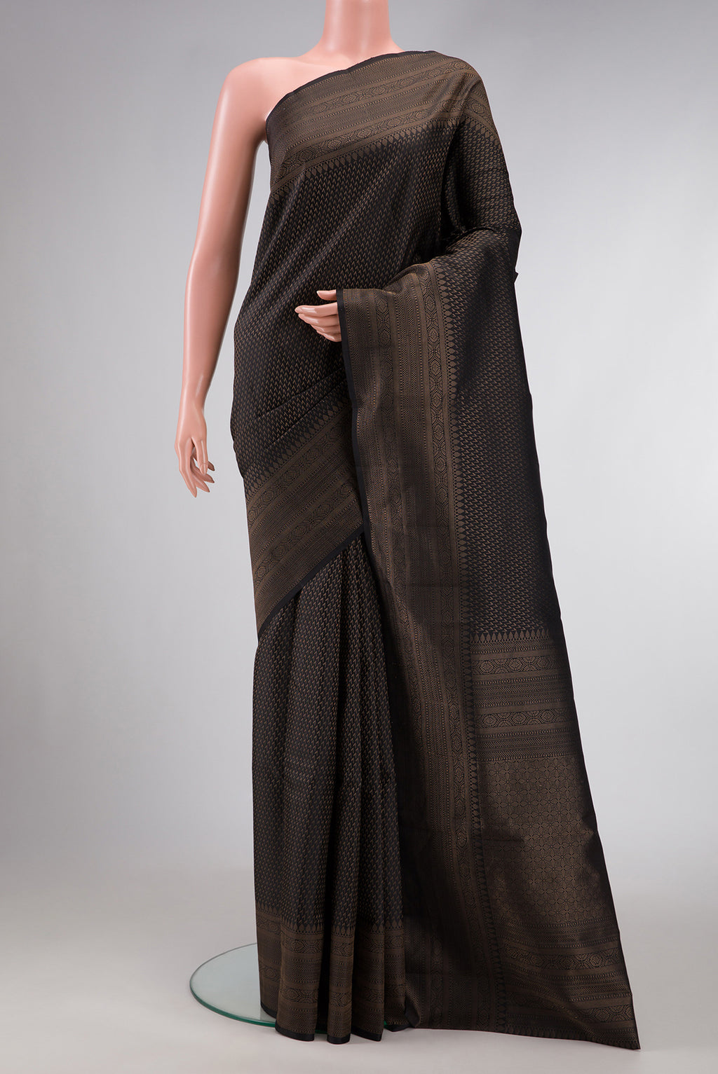 Black Dual Tone Soft Silk Saree with Zari Brocade on the body and Fancy Border.  displayed on a mannequin