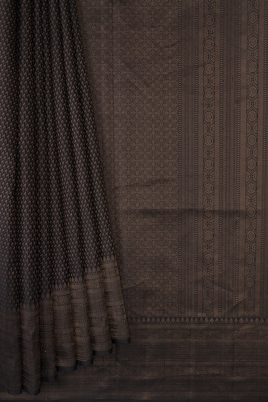 Pleats and pallu of Black Dual Tone Soft Silk Saree with Zari Brocade on the body and Fancy Border. 