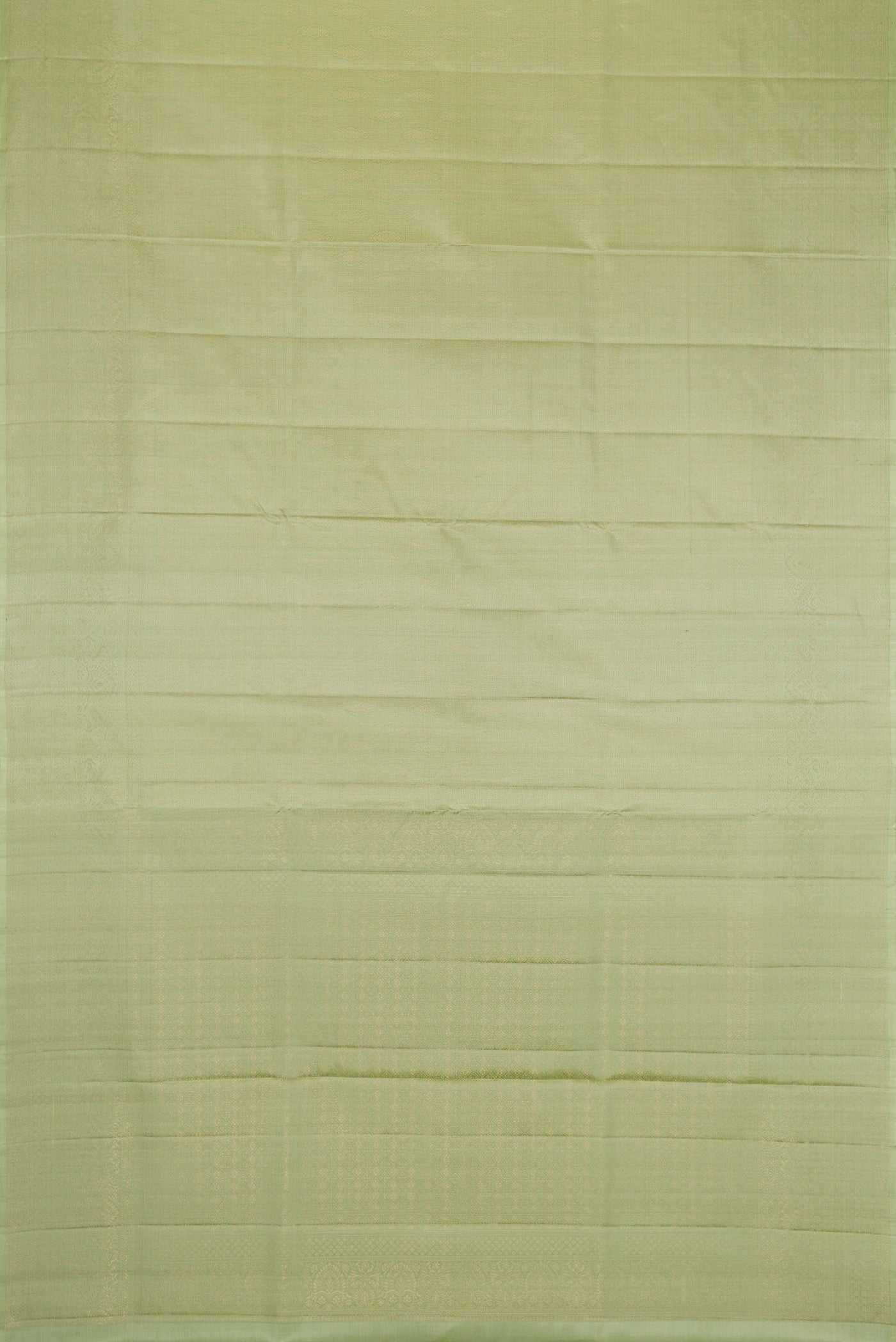 Flat view of Pista Green Dual Tone Soft Silk Saree with Zari Brocade on the body and Fancy Border. 