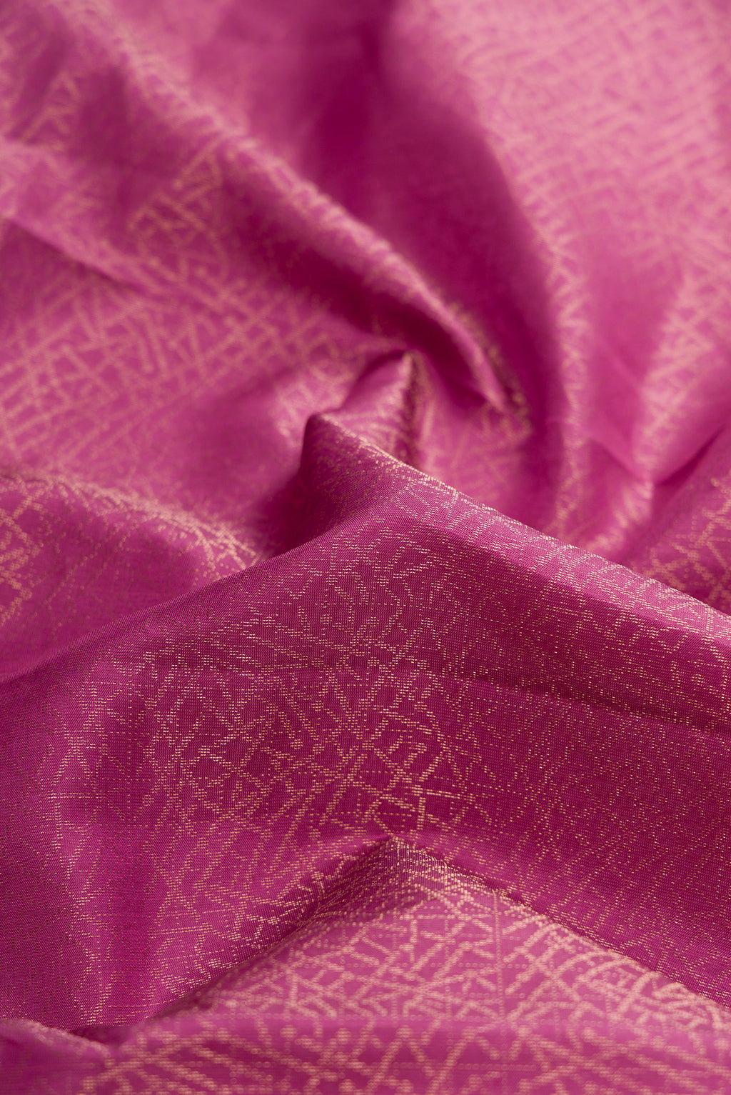 Close up of Purple Dual Tone Soft Silk Saree with Zari Brocade on the body and Zari Border.  displaying folds