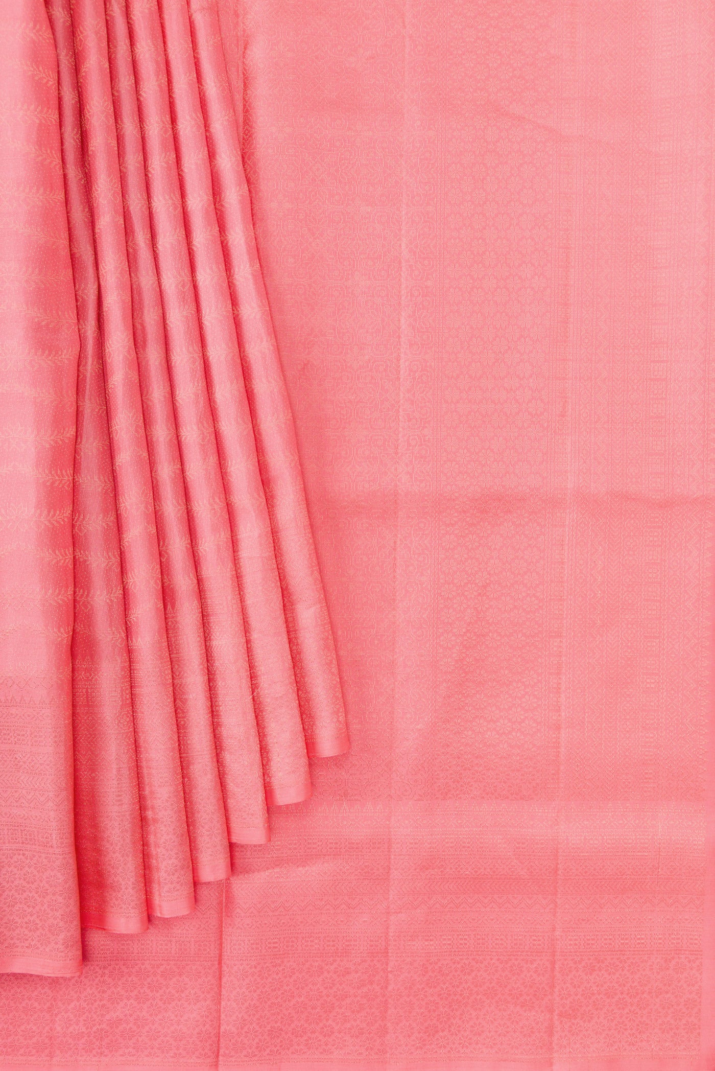 Pleats and pallu of Peach Dual Tone Soft Silk Saree with Zari Brocade on the body and Fancy Border. 