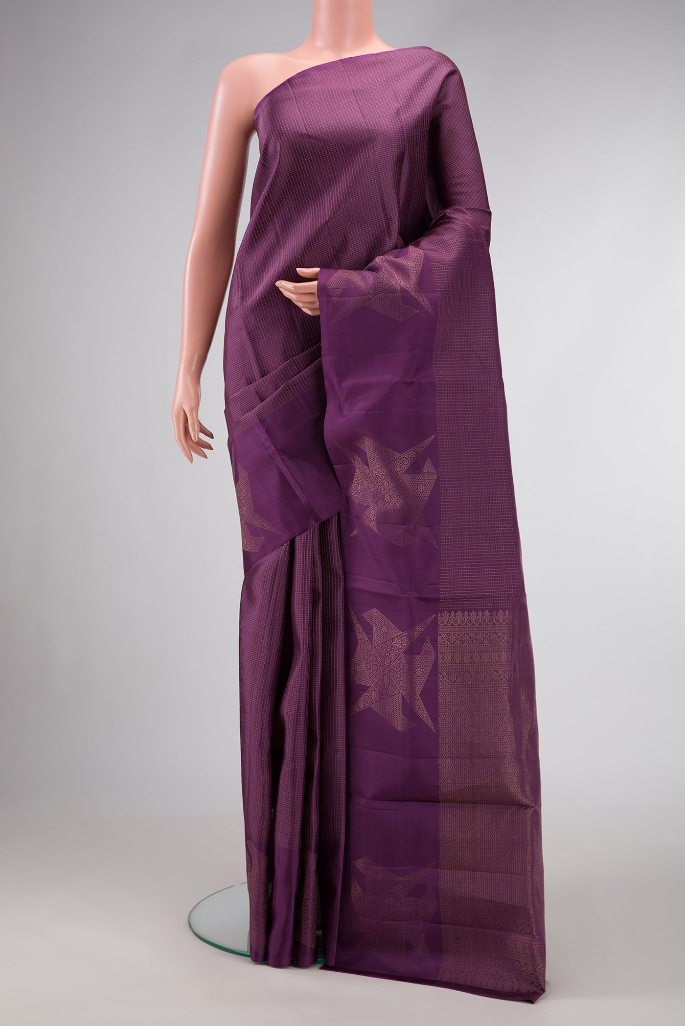 Purple Dual Tone Soft Silk Saree with Zari Brocade on the body and Fancy Border.  displayed on a mannequin