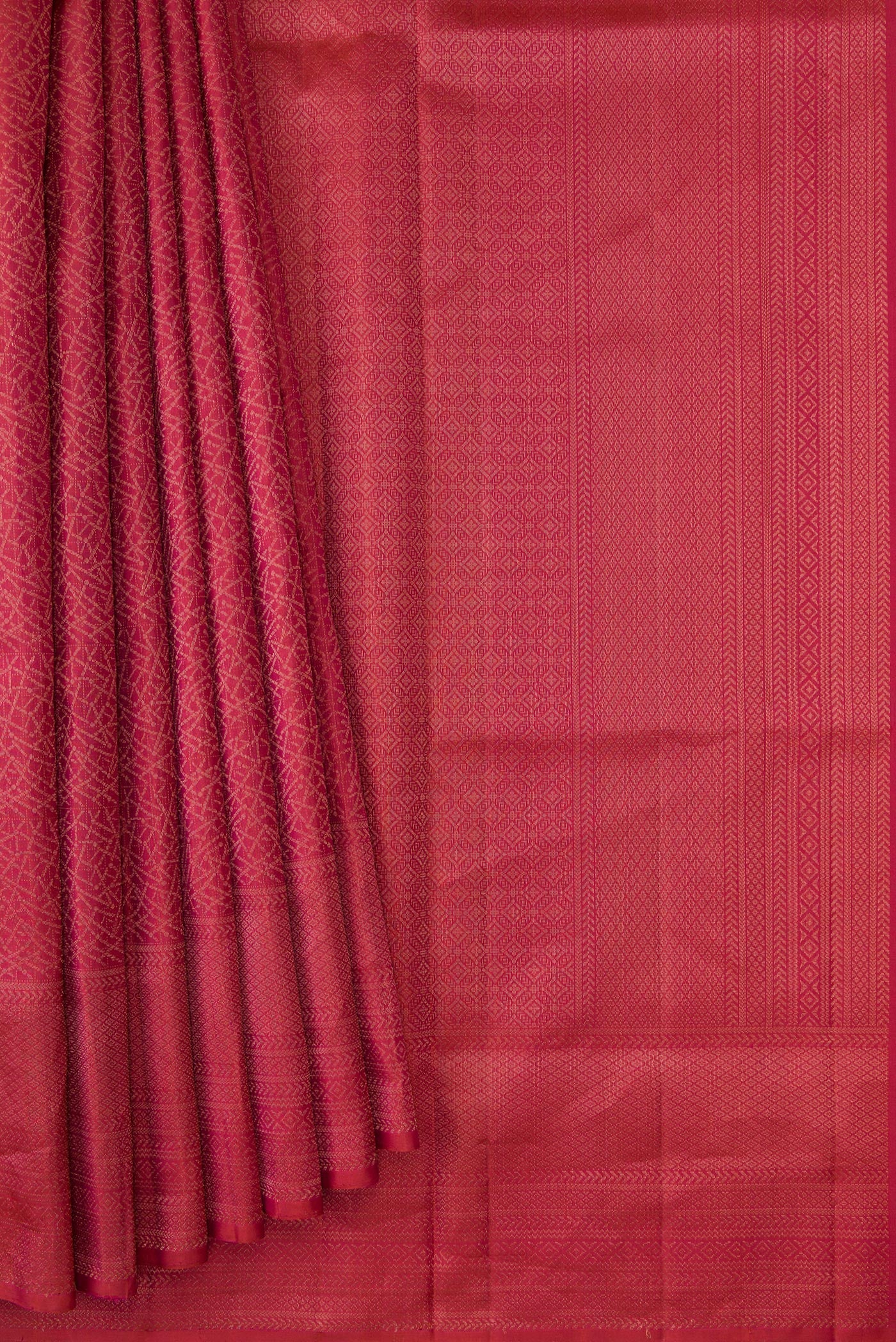 Pleats and pallu of Brick Orange Dual Tone Soft Silk Saree with Zari Brocade on the body and Fancy Border. 