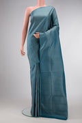 Maya Blue Dual Tone Soft Silk Saree with Zari Brocade on the body and Fancy Border.  displayed on a mannequin