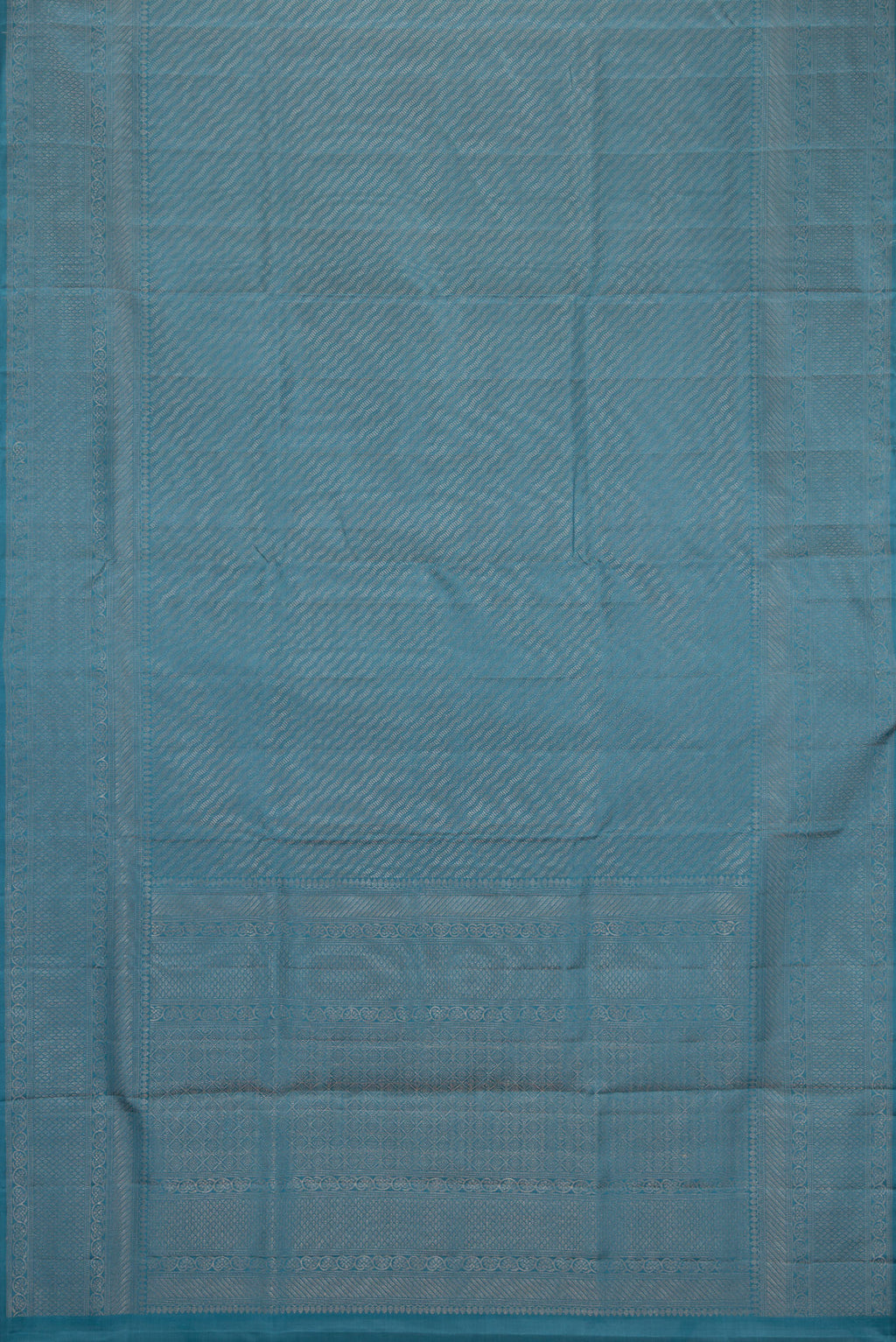 Flat view of Maya Blue Dual Tone Soft Silk Saree with Zari Brocade on the body and Fancy Border. 