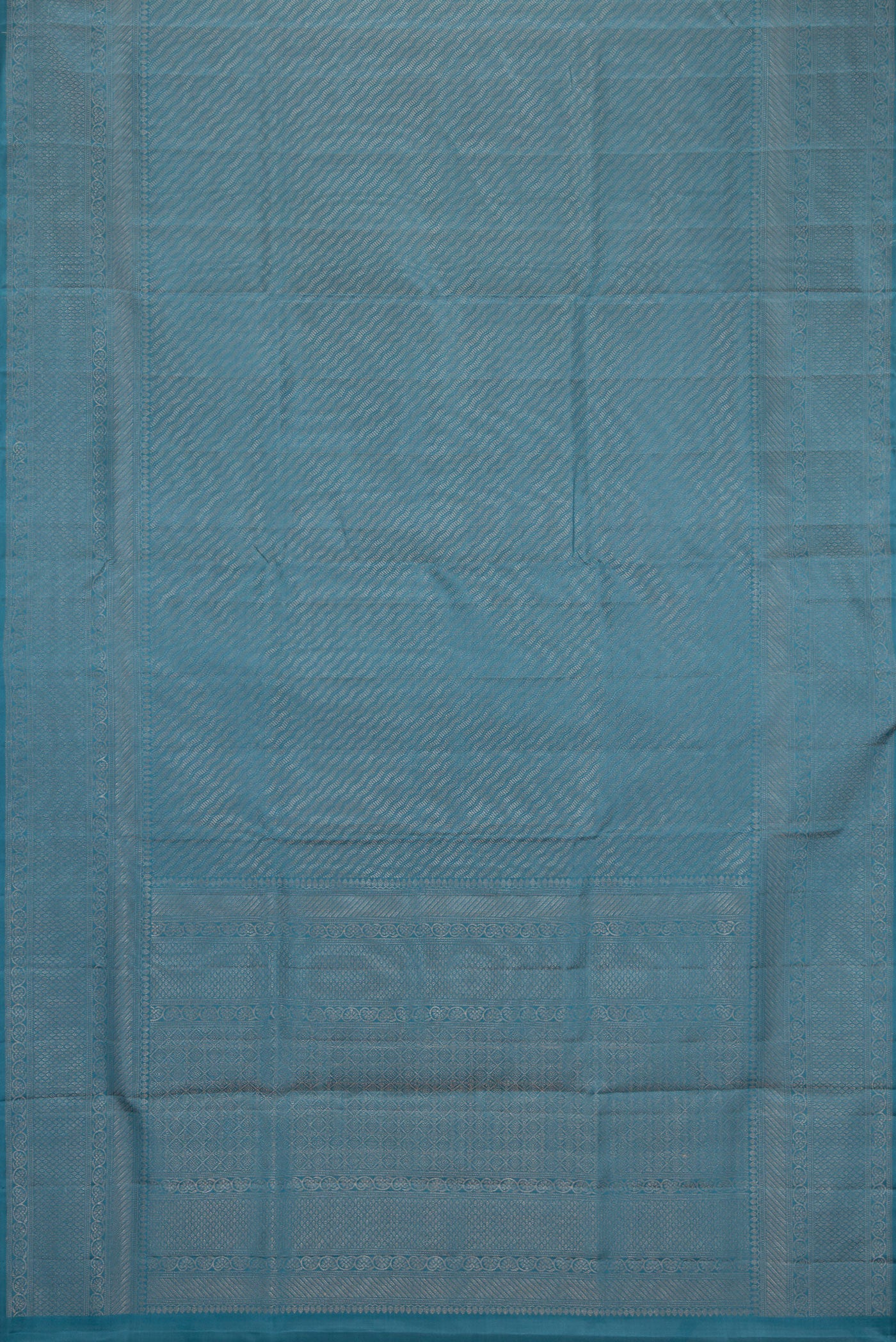 Flat view of Maya Blue Dual Tone Soft Silk Saree with Zari Brocade on the body and Fancy Border. 
