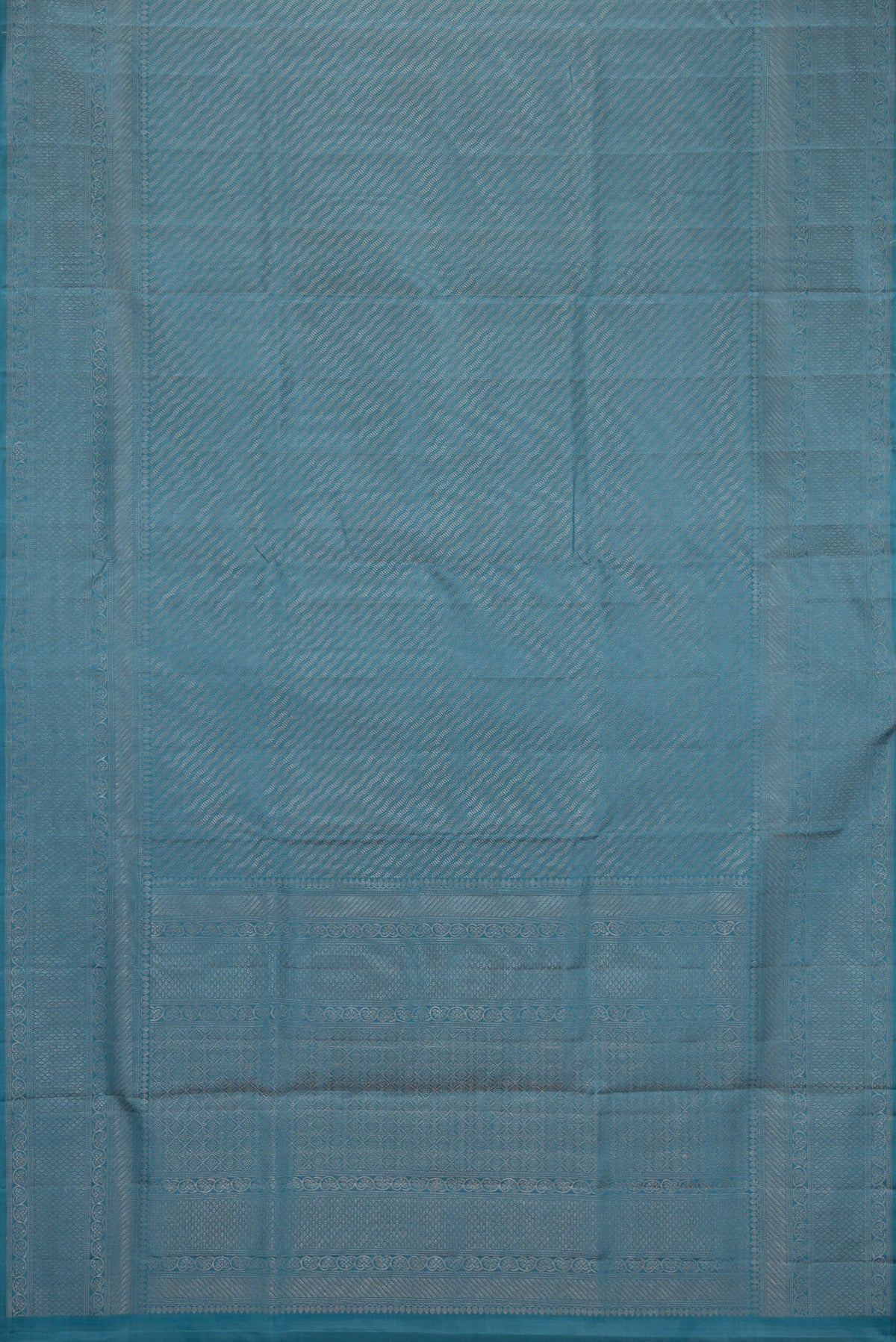 Flat view of Maya Blue Dual Tone Soft Silk Saree with Zari Brocade on the body and Fancy Border. 