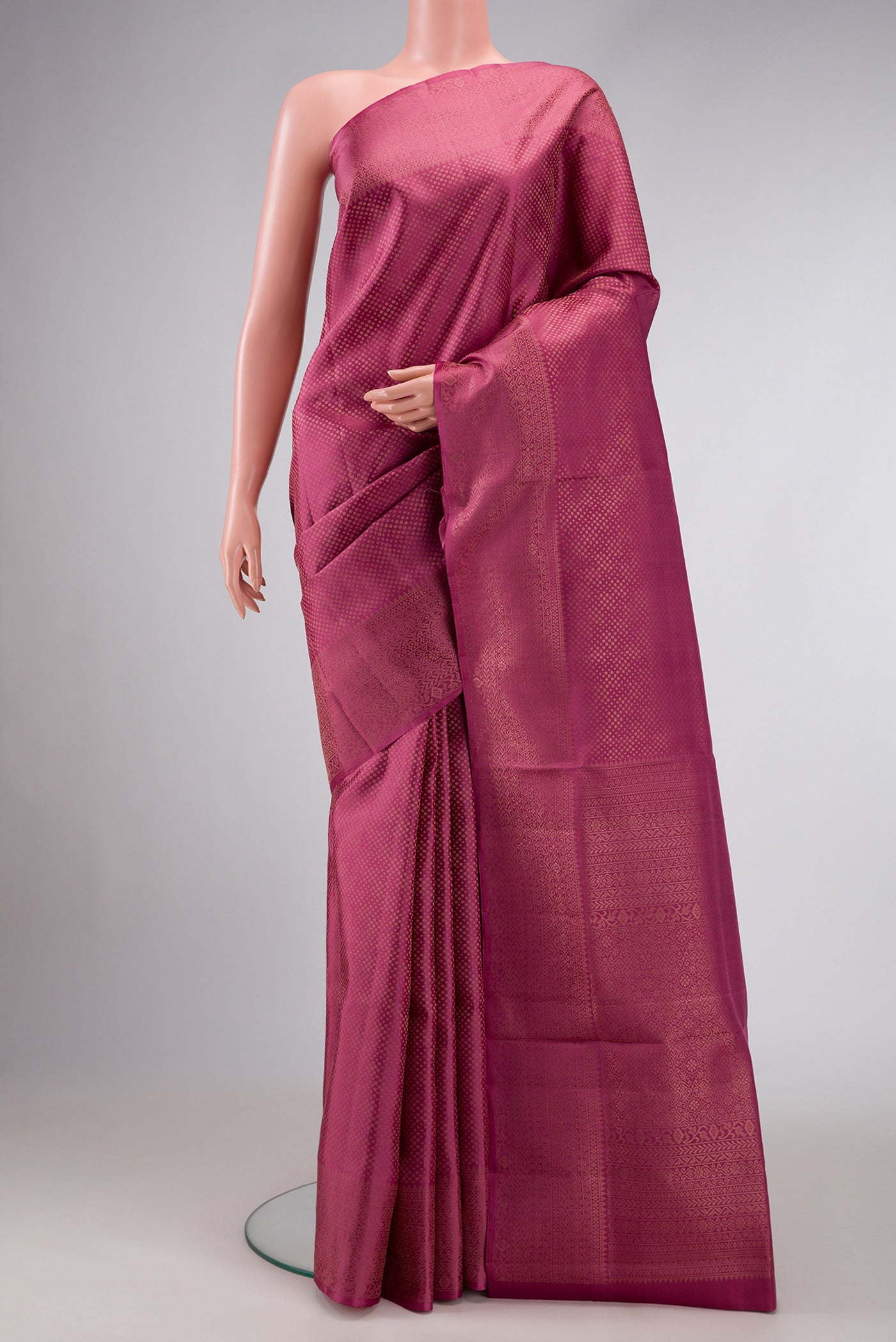 Pink Dual Tone Soft Silk Saree with Zari Brocade on the body and Fancy Border.  displayed on a mannequin