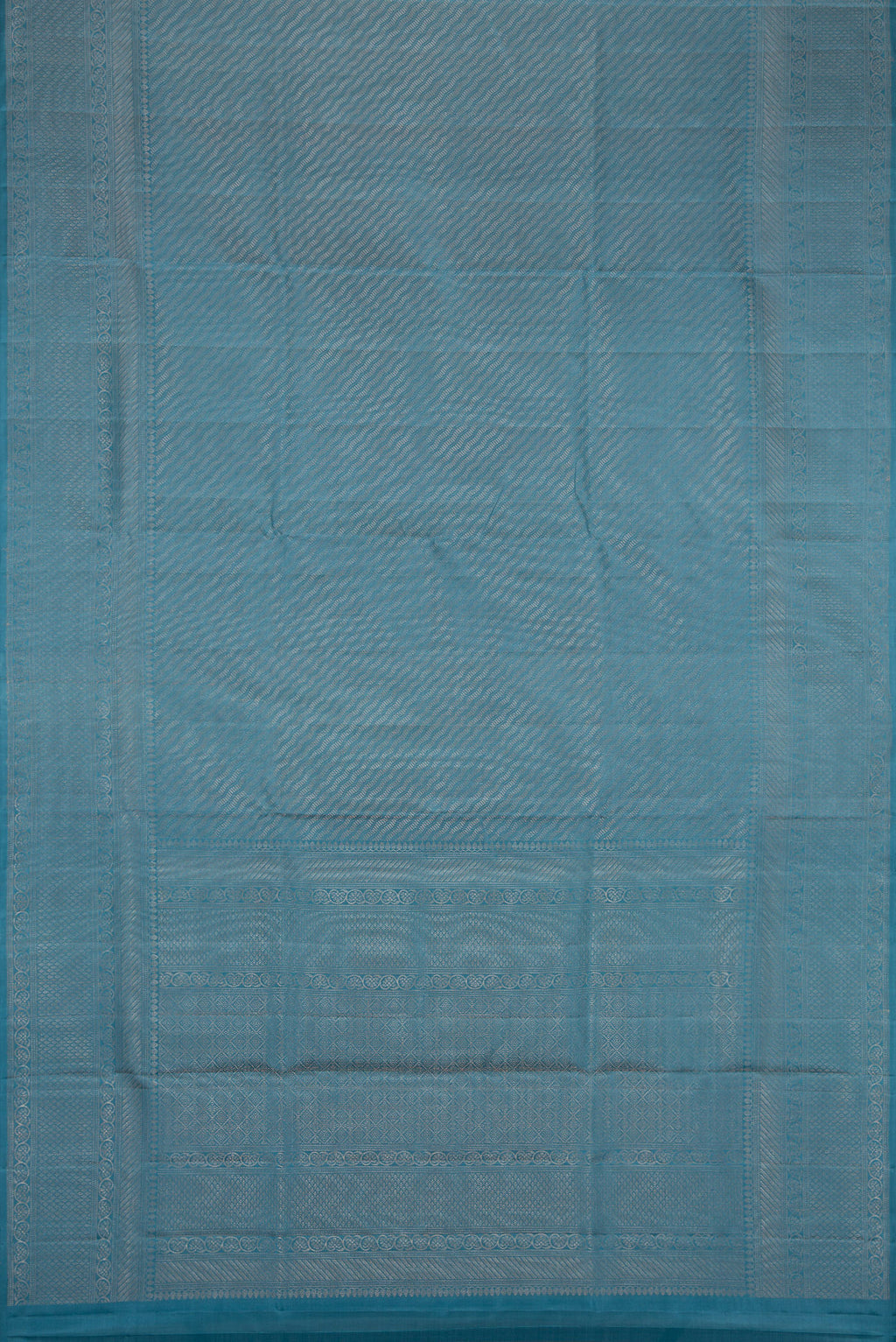 Flat view of Maya Blue Dual Tone Soft Silk Saree with Zari Brocade on the body and Fancy Border. 