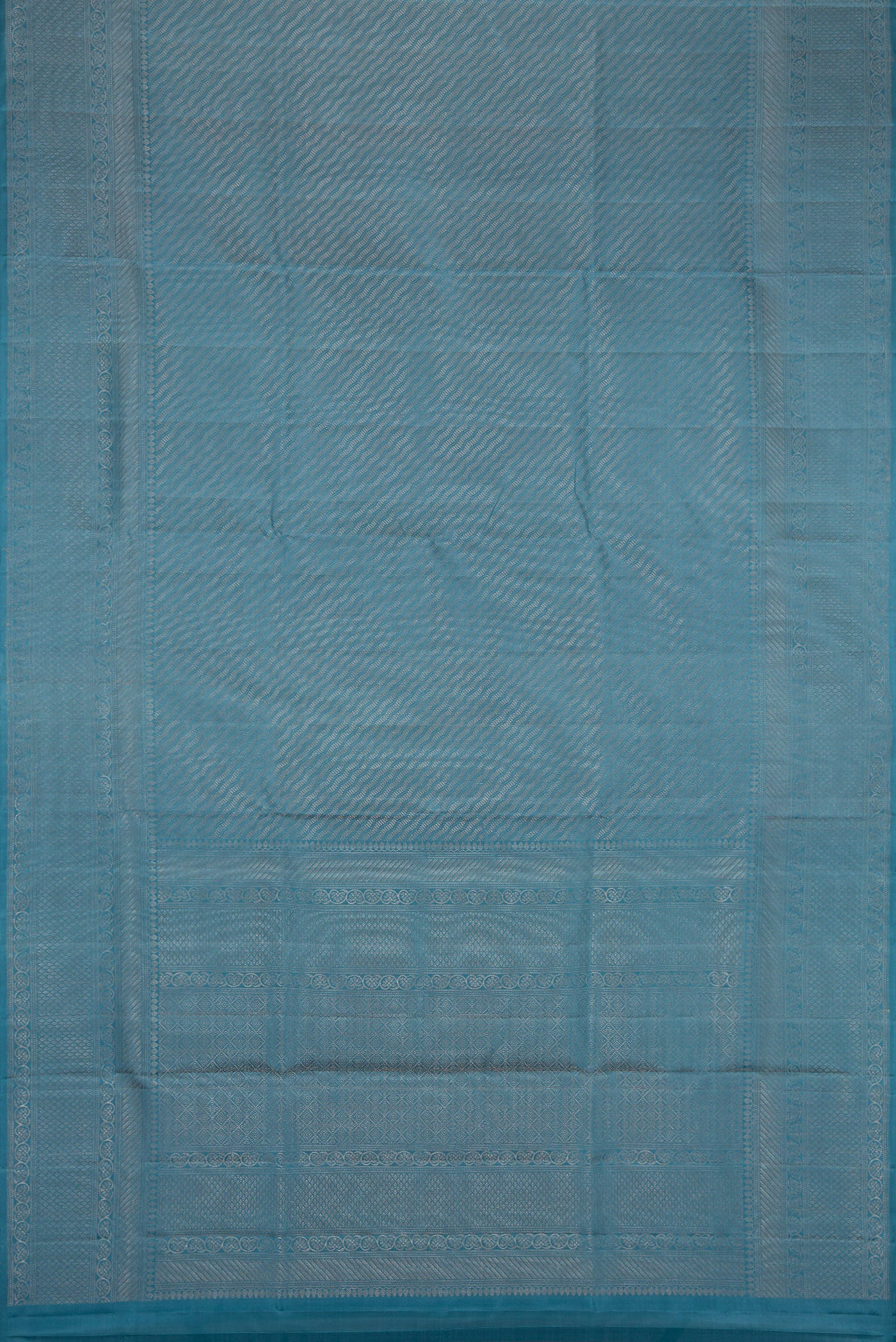 Flat view of Maya Blue Dual Tone Soft Silk Saree with Zari Brocade on the body and Fancy Border. 