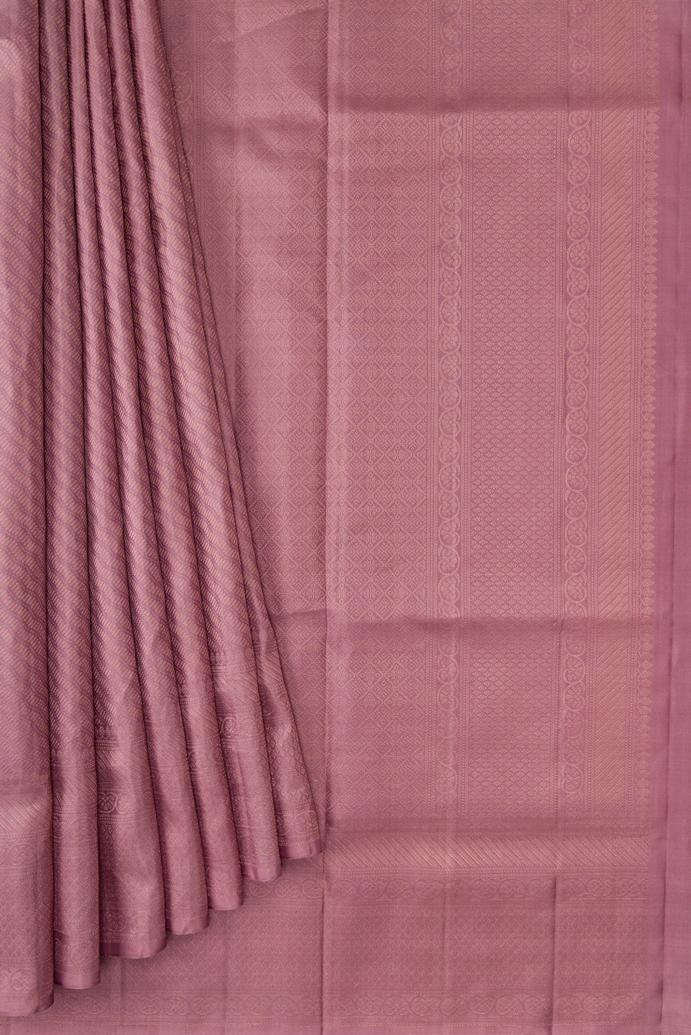 Pleats and pallu of Rose Gold Dual Tone Soft Silk Saree with Zari Brocade on the body and Zari Border. 