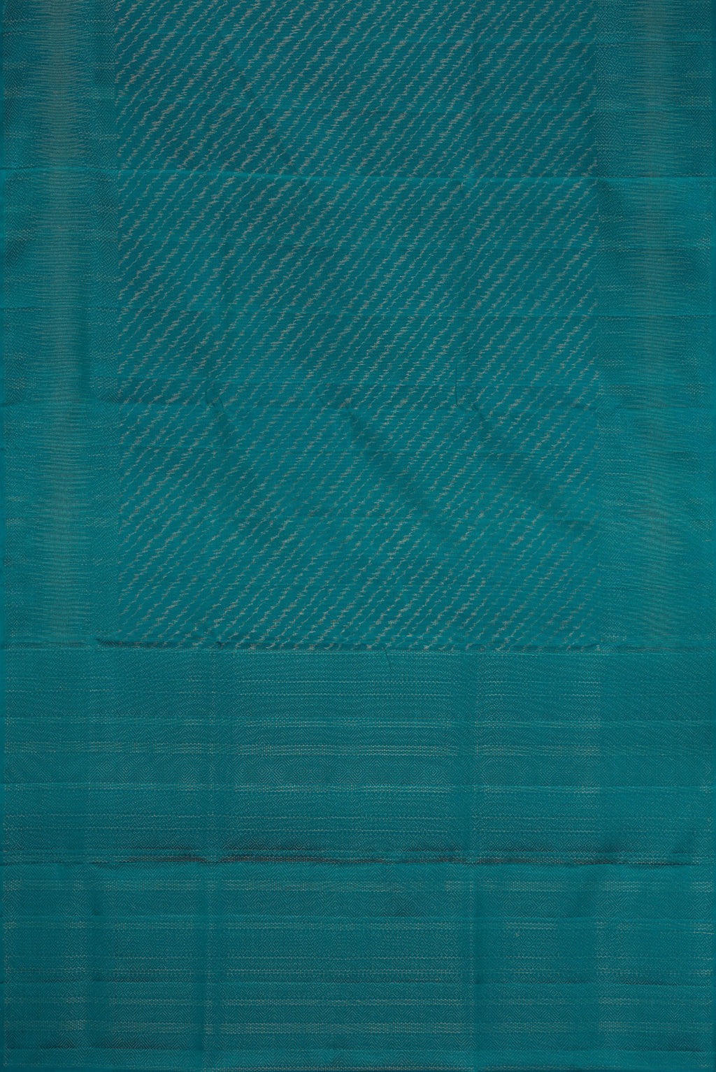Flat view of Peacock Blue Dual Tone Soft Silk Saree with Zari Brocade on the body and Zari Border. 