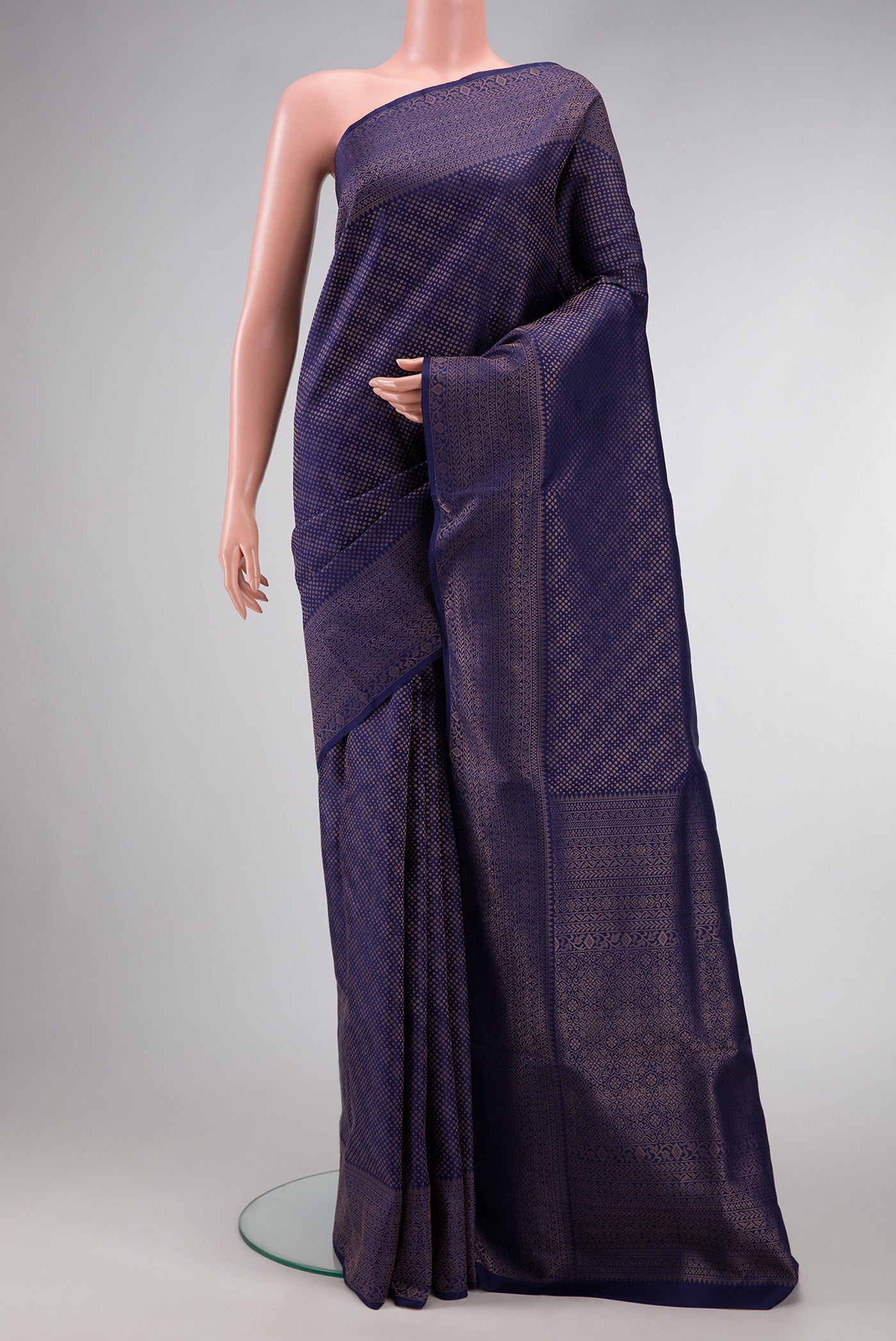 Navy Blue Dual Tone Soft Silk Saree with Zari Brocade on the body and Fancy Border.  displayed on a mannequin