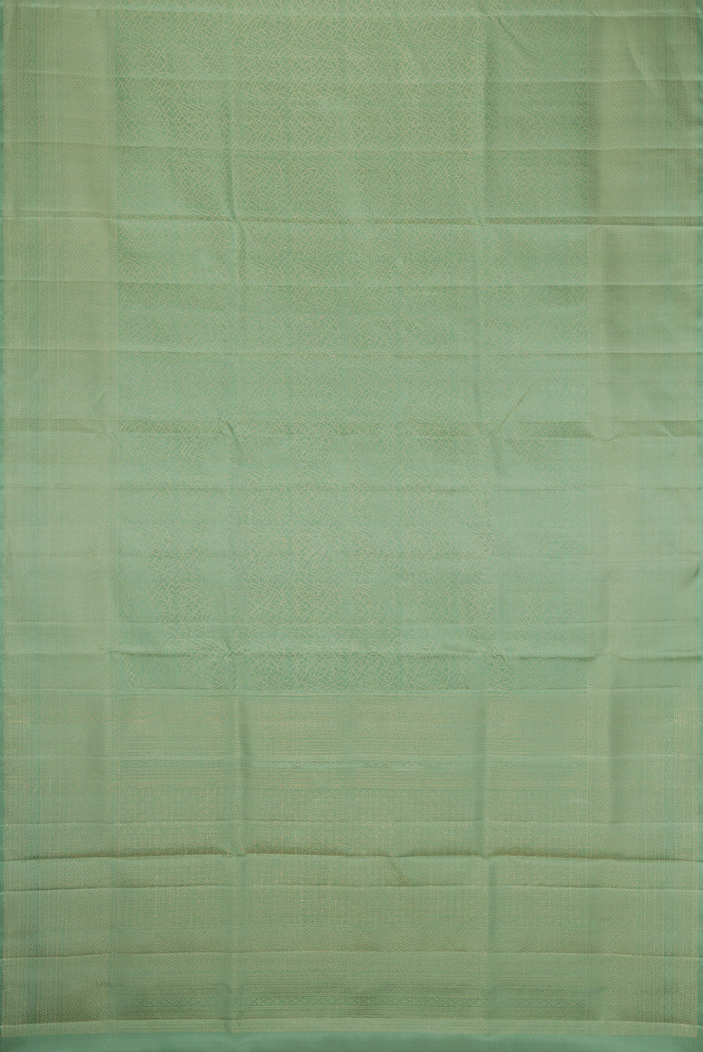 Flat view of Pista Green Dual Tone Soft Silk Saree with Zari Brocade on the body and Fancy Border. 