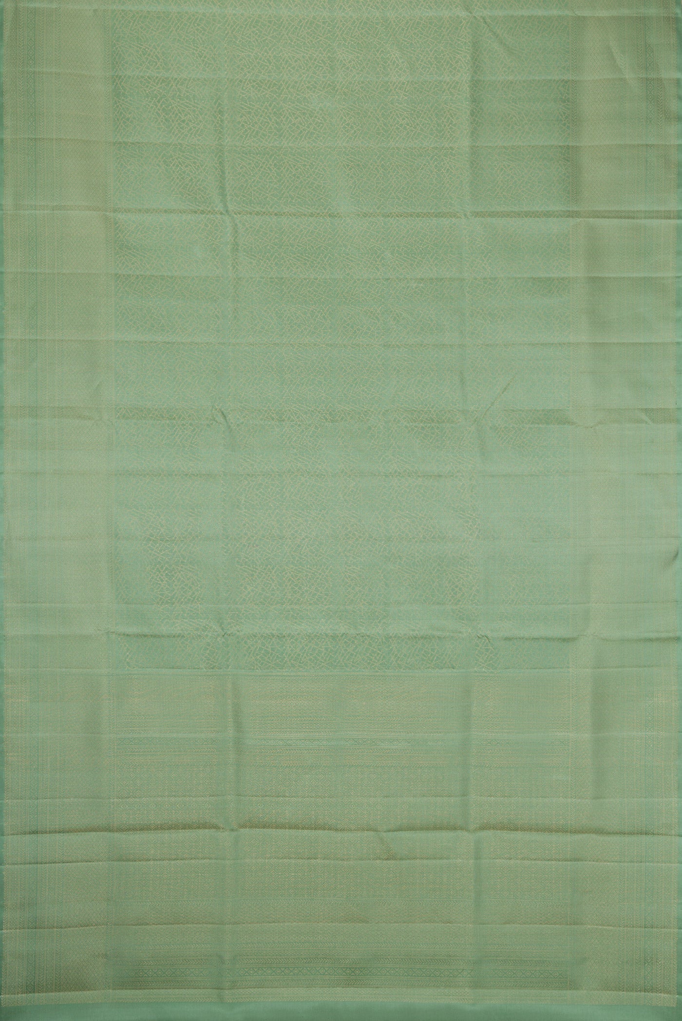 Flat view of Pista Green Dual Tone Soft Silk Saree with Zari Brocade on the body and Fancy Border. 