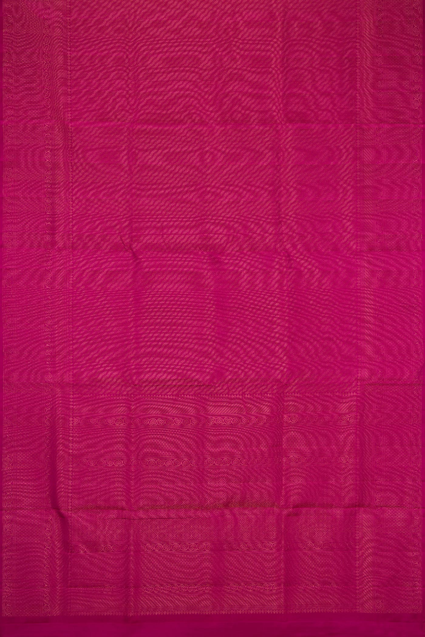 Flat view of Magenta Dual Tone Soft Silk Saree with Zari Brocade on the body and Fancy Border. 