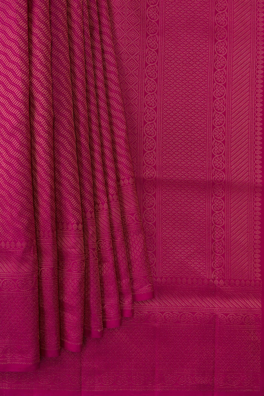Pleats and pallu of Magenta Dual Tone Soft Silk Saree with Zari Brocade on the body and Fancy Border. 