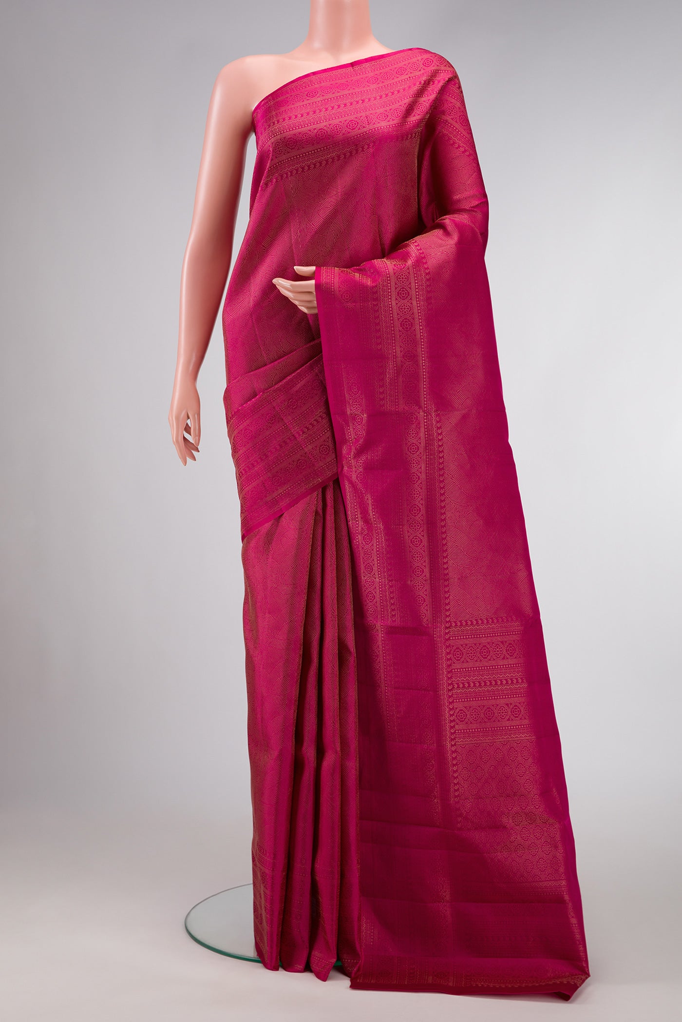 Magenta Dual Tone Soft Silk Saree with Zari Brocade on the body and Fancy Border.  displayed on a mannequin