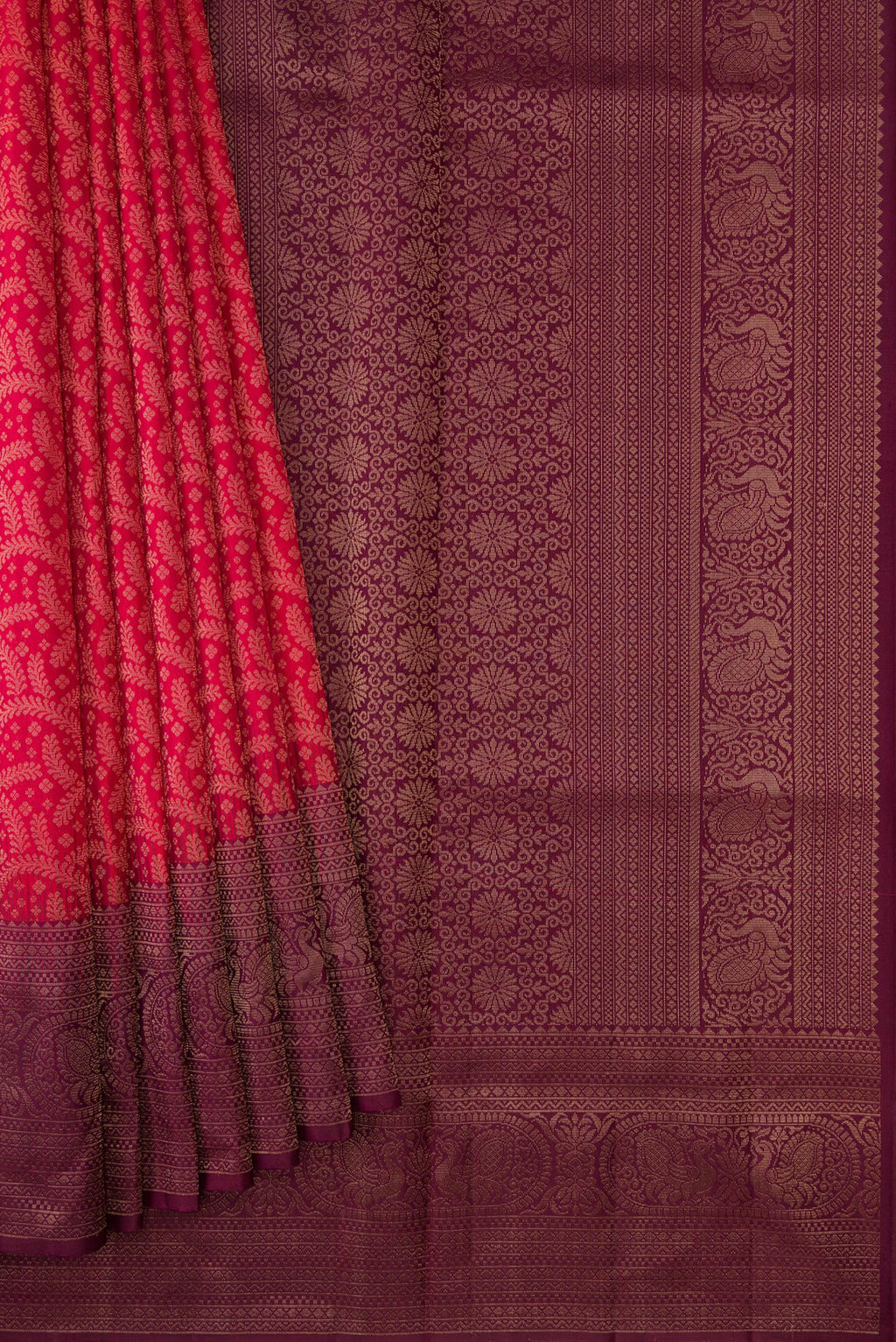 Pleats and pallu of Brick Orange Dual Tone Soft Silk Saree with Zari Brocade on the body and Fancy Border. 
