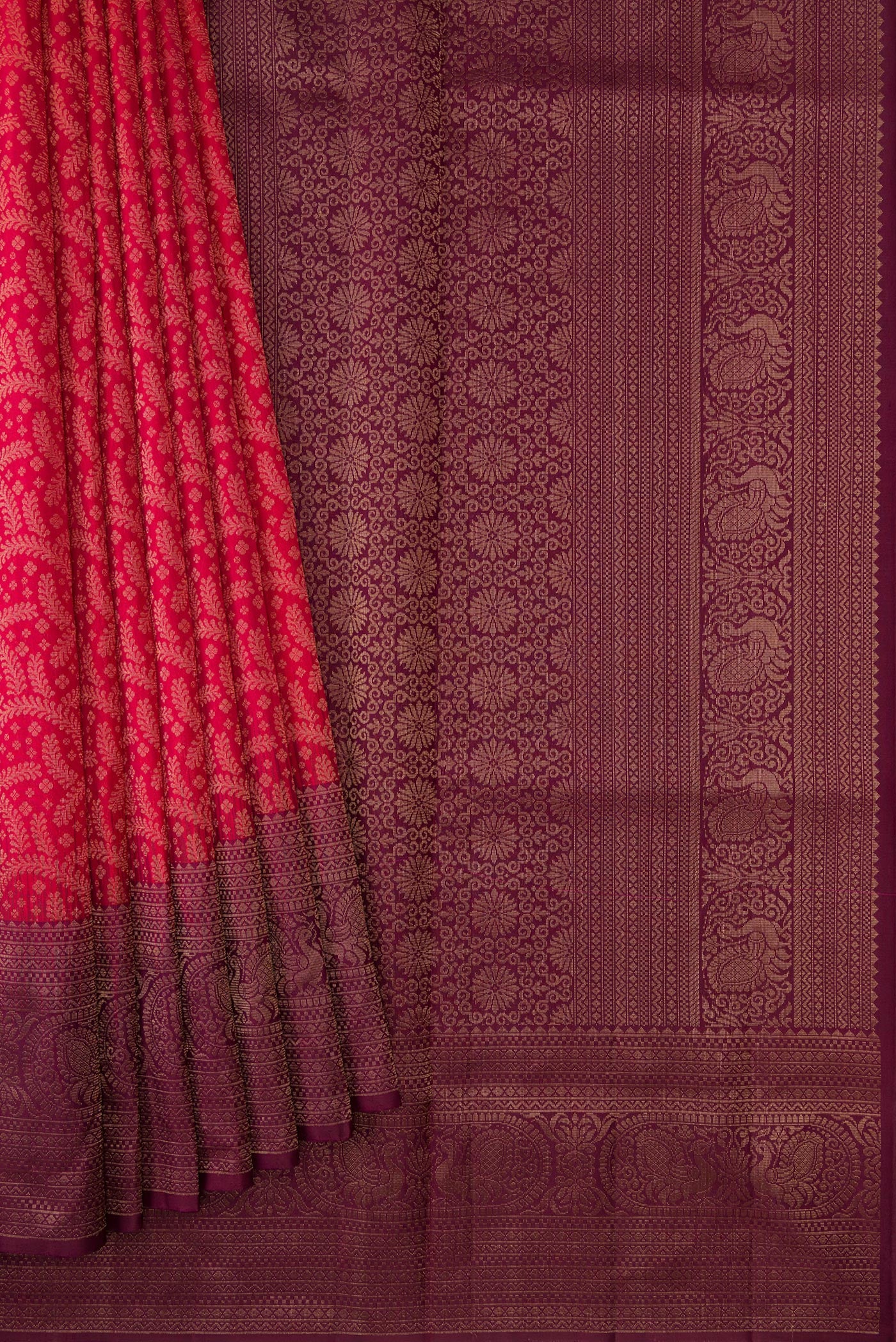 Pleats and pallu of Brick Orange Dual Tone Soft Silk Saree with Zari Brocade on the body and Fancy Border. 