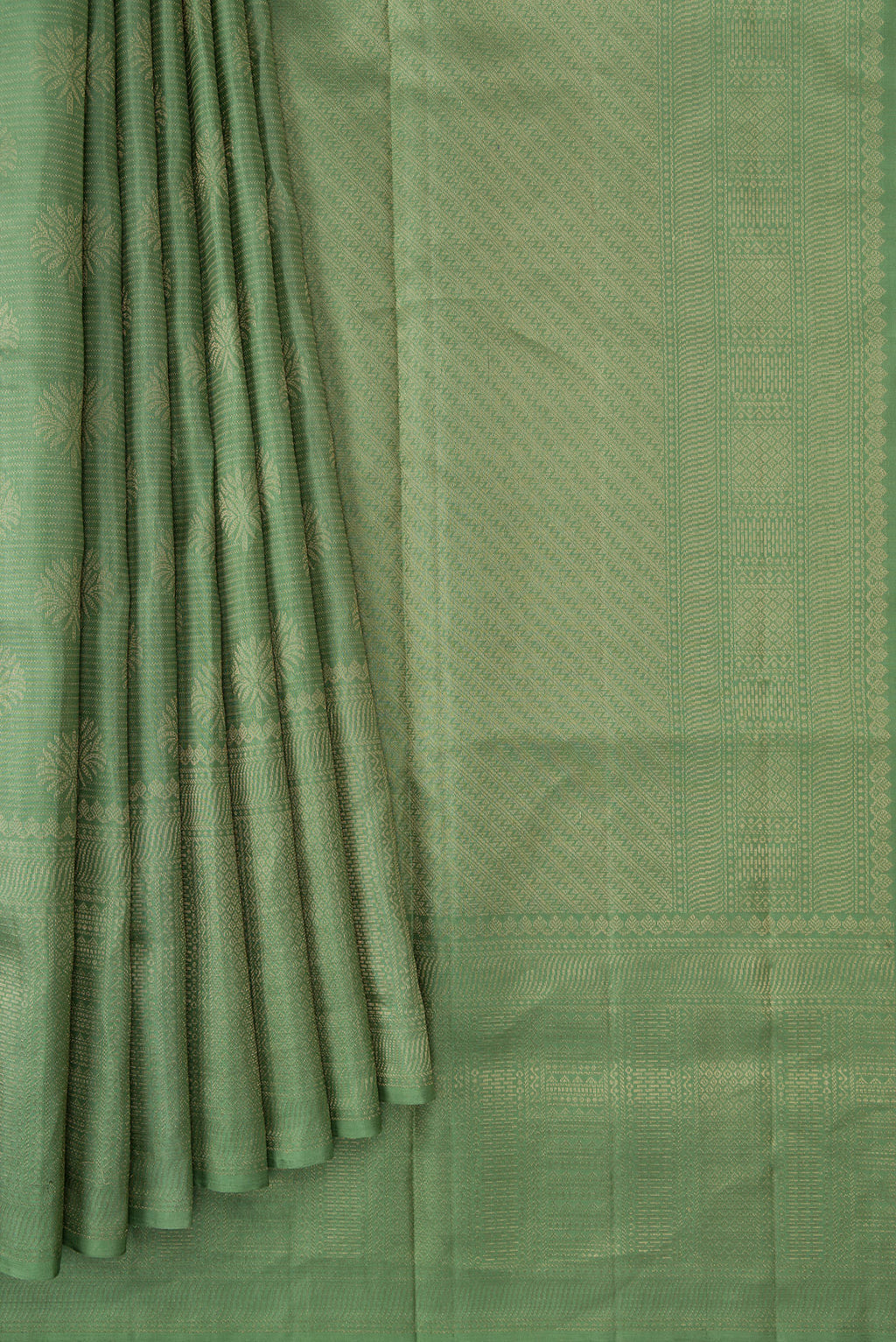 Pleats and pallu of Pista Green Dual Tone Soft Silk Saree with Zari Brocade on the body and Fancy Border. 