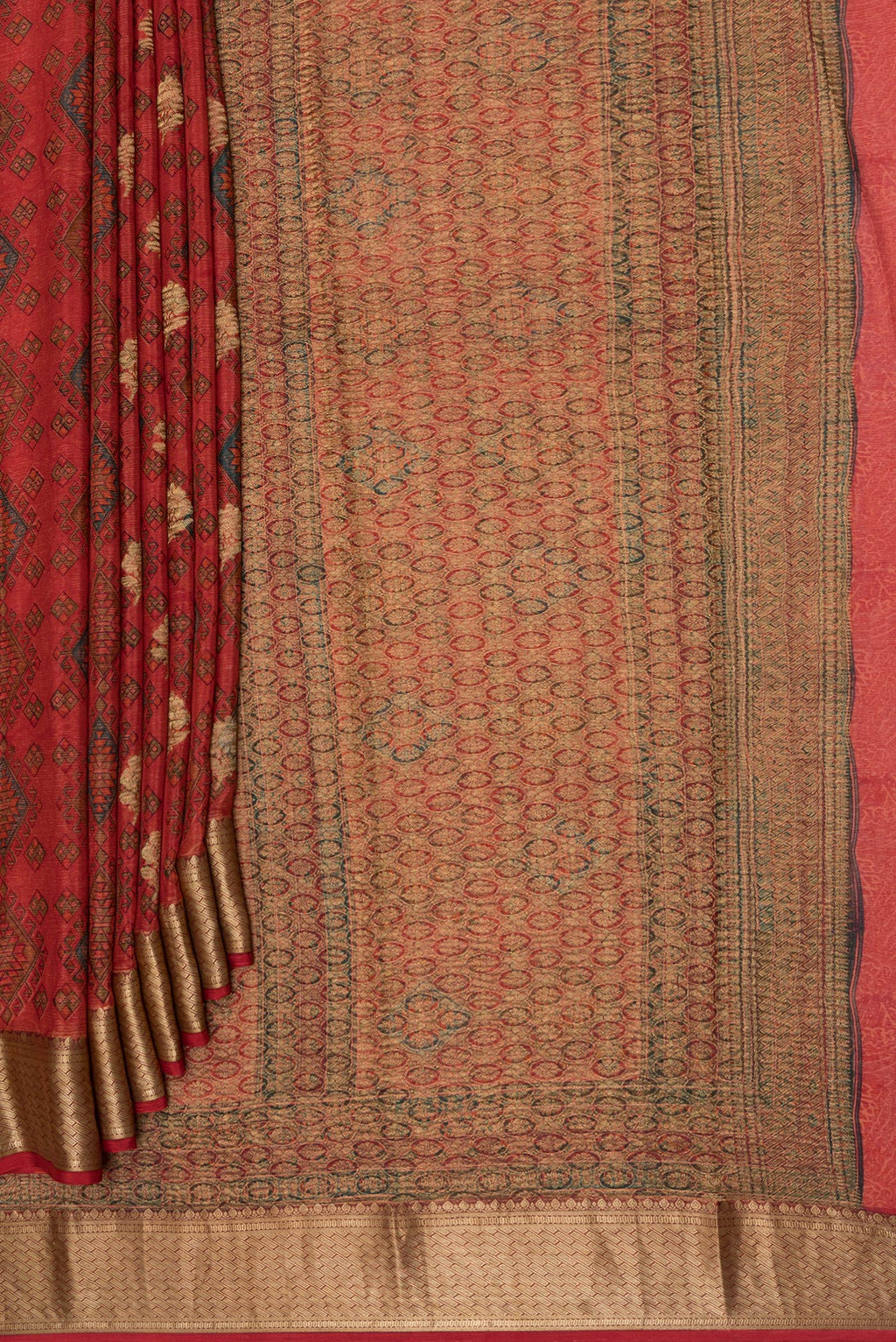 Pleats and pallu of Orange Crepe Saree with Printed design on the body and Zari Border. 