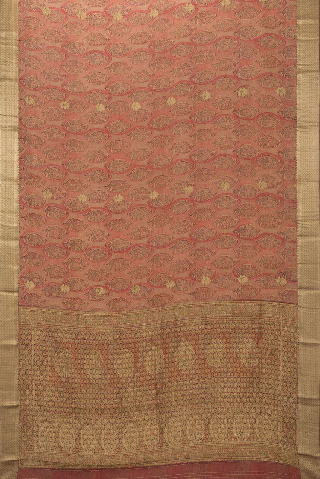 Flat view of Brown Crepe Saree with Printed design on the body and Zari Border. 