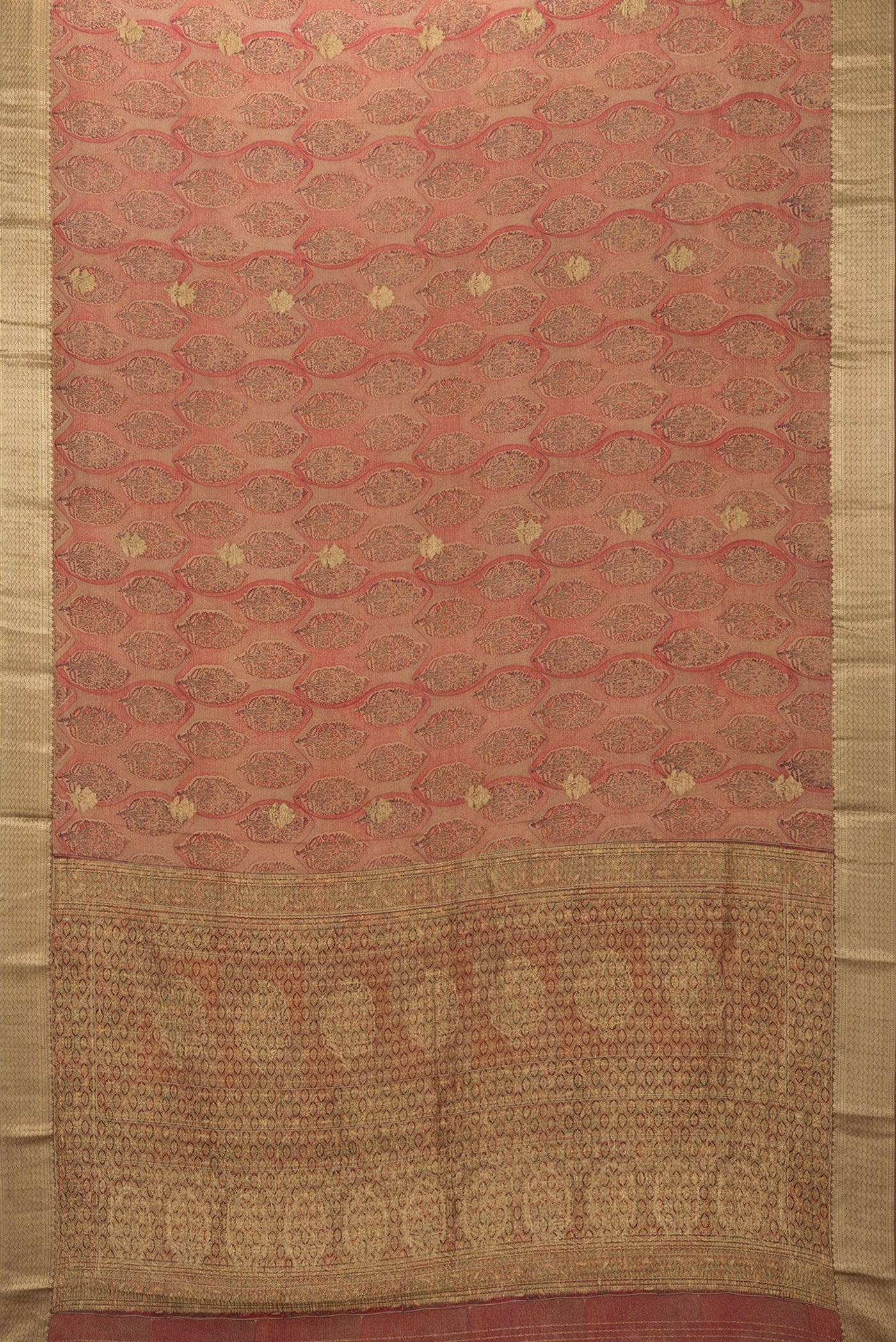 Flat view of Brown Crepe Saree with Printed design on the body and Zari Border. 