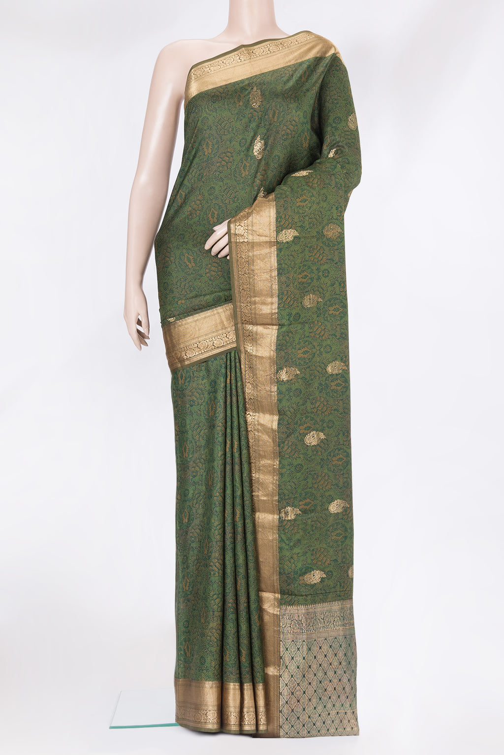 Mehandi Green Kanchipuram Silk Saree with Printed design on the body and Zari Border.  displayed on a mannequin