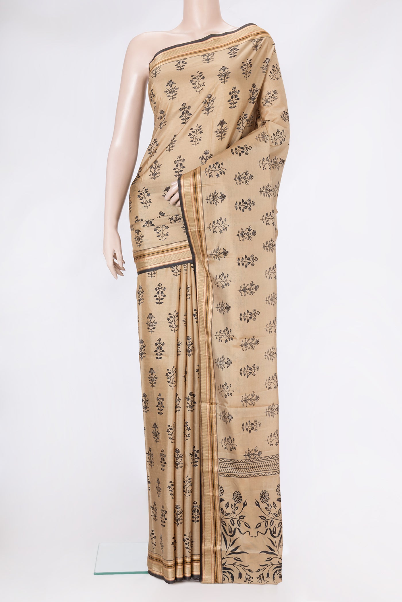 Beige Dual Tone Kanjivaram Silk Saree with Printed design on the body and Thread Border.  displayed on a mannequin
