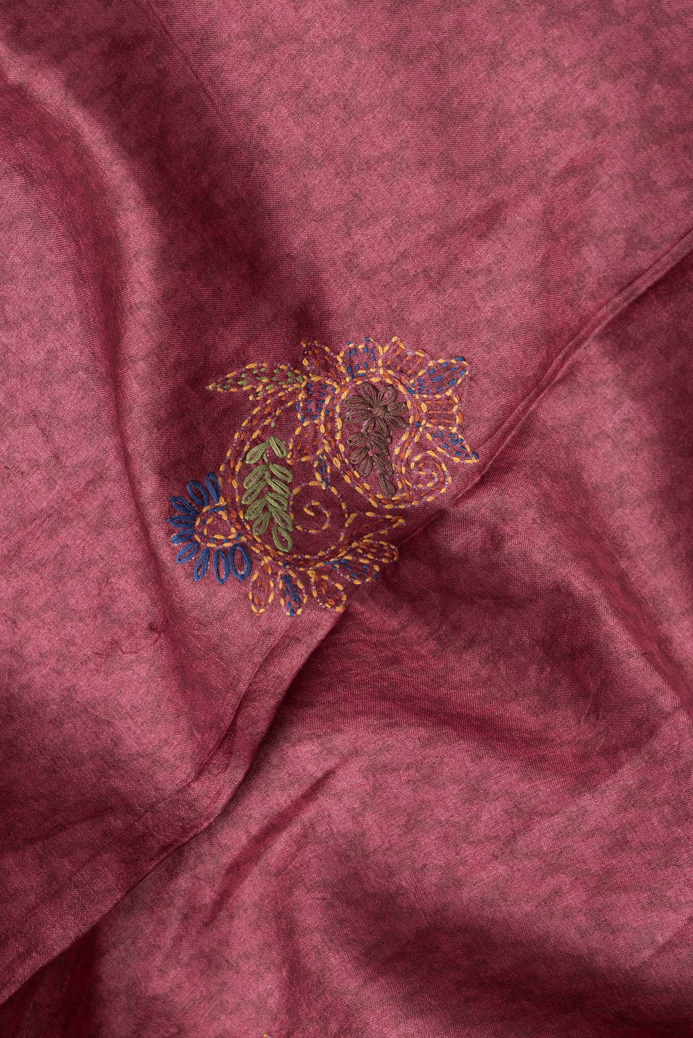 Close up of Peacock Blue Dual Tone Tussar Silk Saree with Printed design on the body and Embroidery Border.  displaying folds