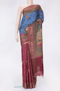 Peacock Blue Dual Tone Tussar Silk Saree with Printed design on the body and Embroidery Border.  displayed on a mannequin