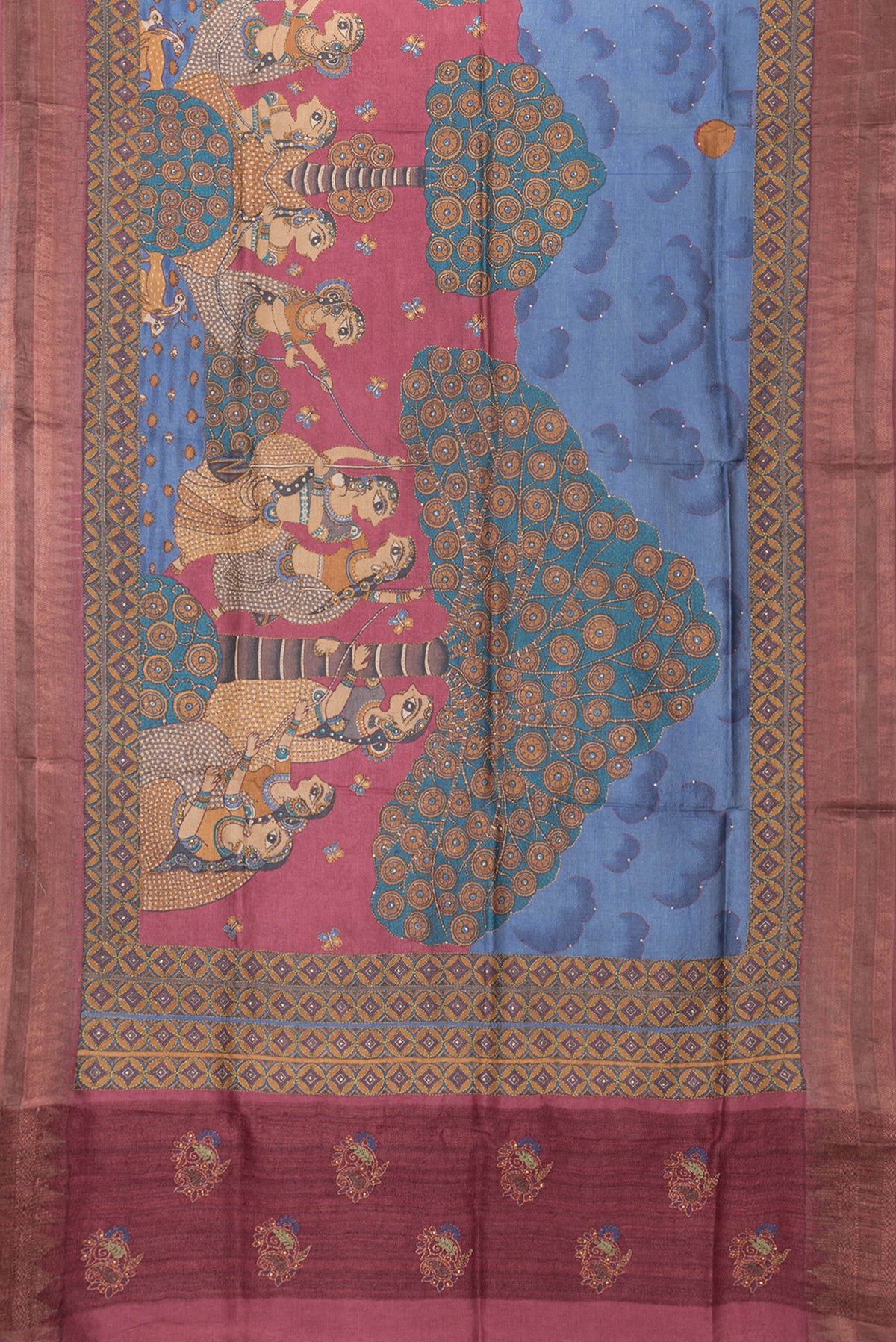 Flat view of Peacock Blue Dual Tone Tussar Silk Saree with Printed design on the body and Embroidery Border. 