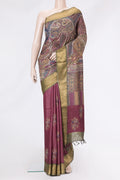 Magenta Dual Tone Tussar Silk Saree with Embroidery on the body and Zari Border.  displayed on a mannequin