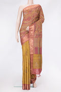 Mustard Dual Tone Tussar Silk Saree with Embroidery on the body and Zari Border.  displayed on a mannequin