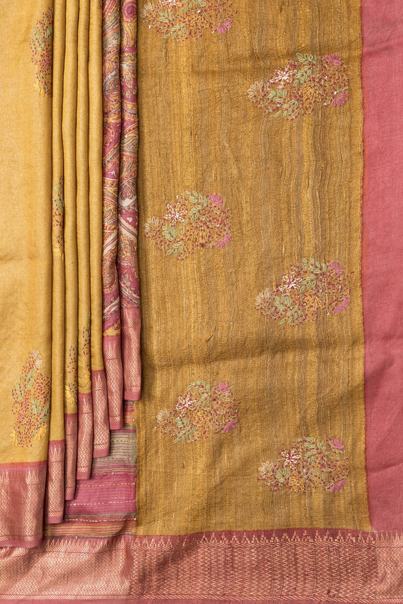 Pleats and pallu of Mustard Dual Tone Tussar Silk Saree with Embroidery on the body and Zari Border. 