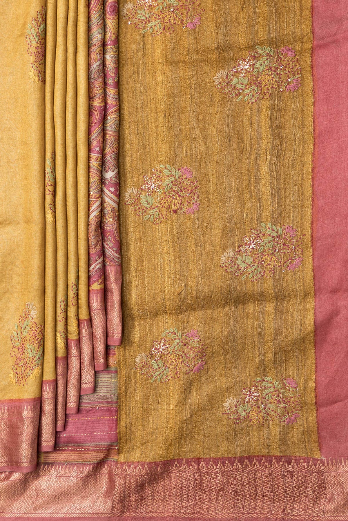 Pleats and pallu of Mustard Dual Tone Tussar Silk Saree with Embroidery on the body and Zari Border. 