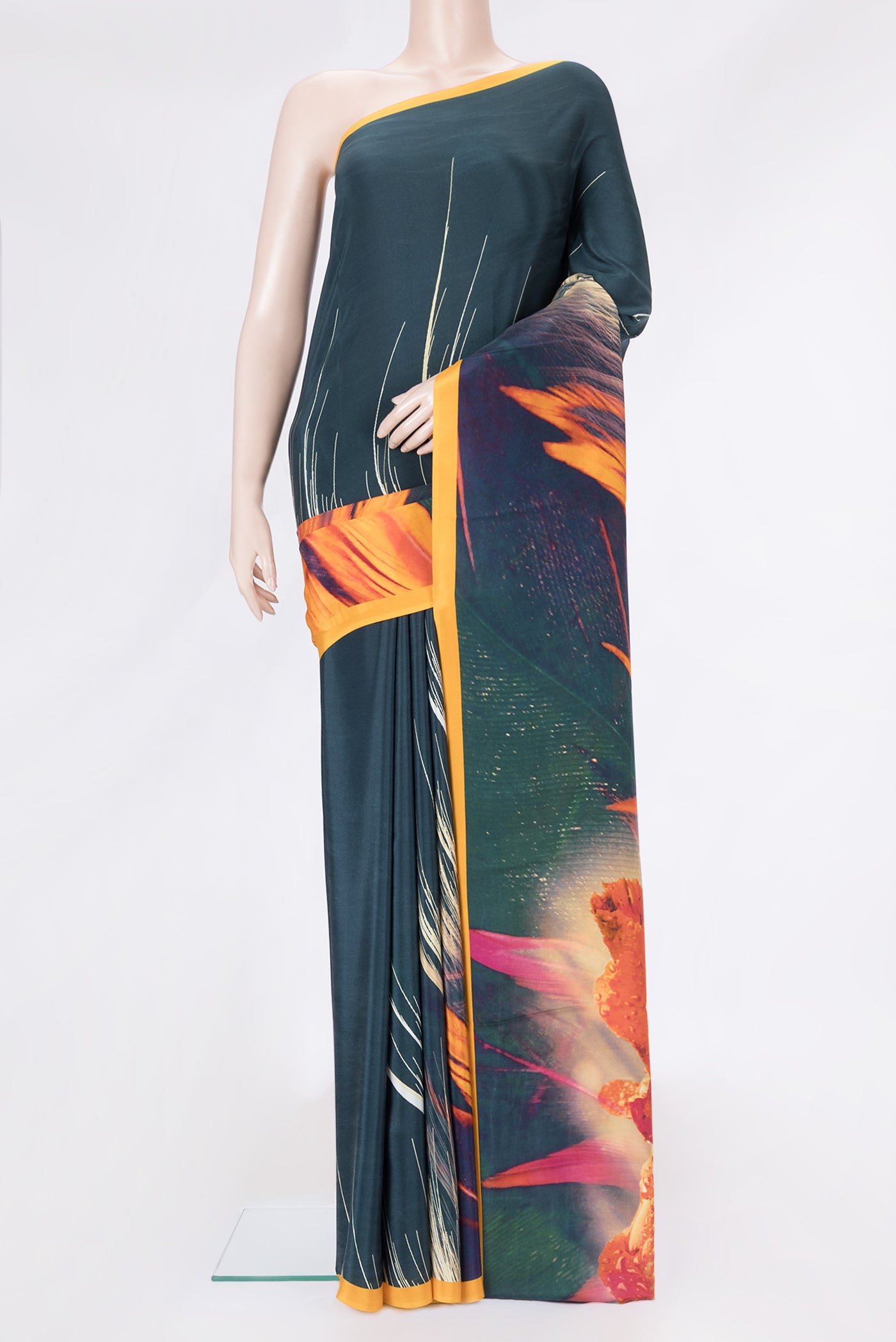 Green Dual Tone Mysore Crepe Saree with Printed design on the body and Plain Border.  displayed on a mannequin